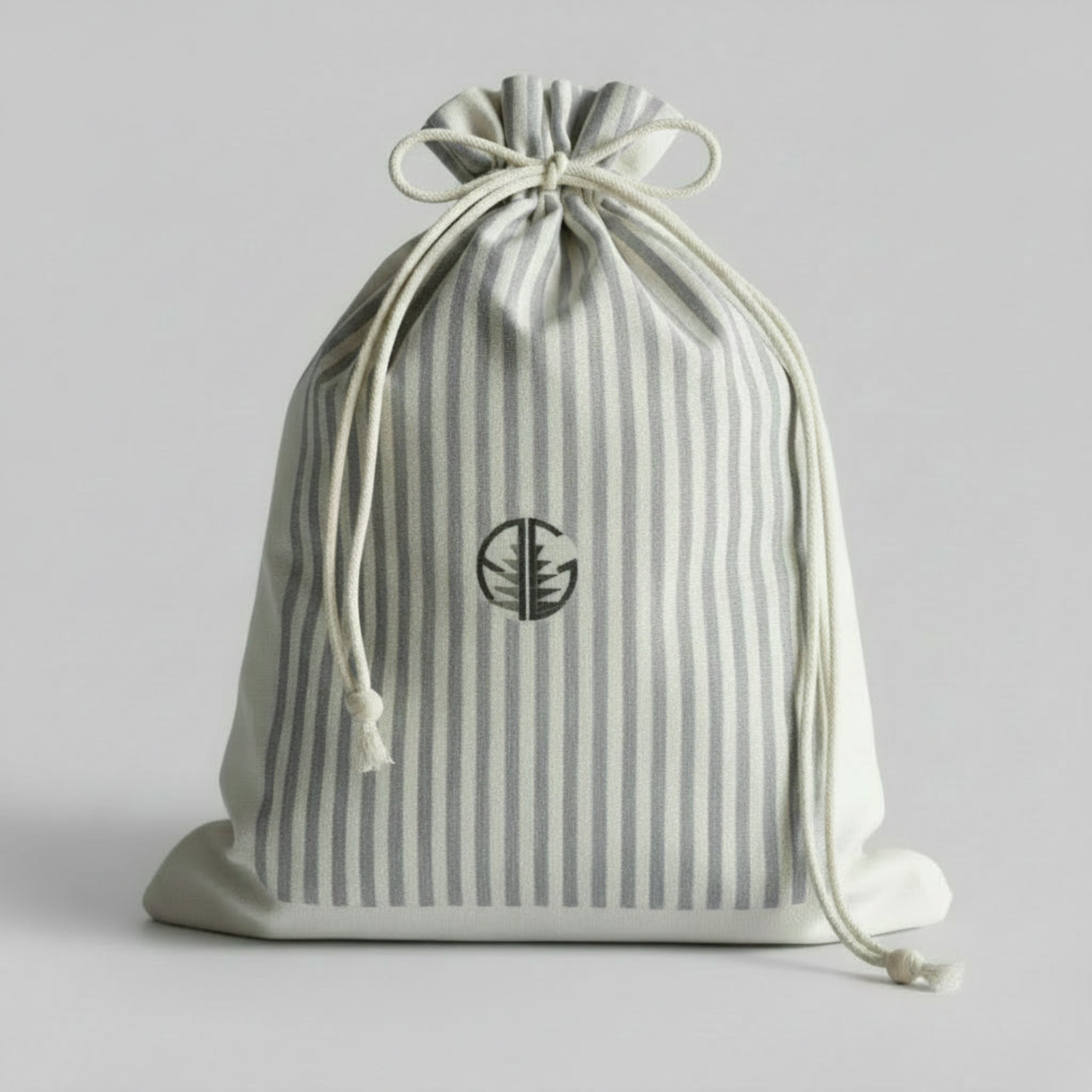 Natural cotton drawstring pouch with blue strips and 'AG' logo.