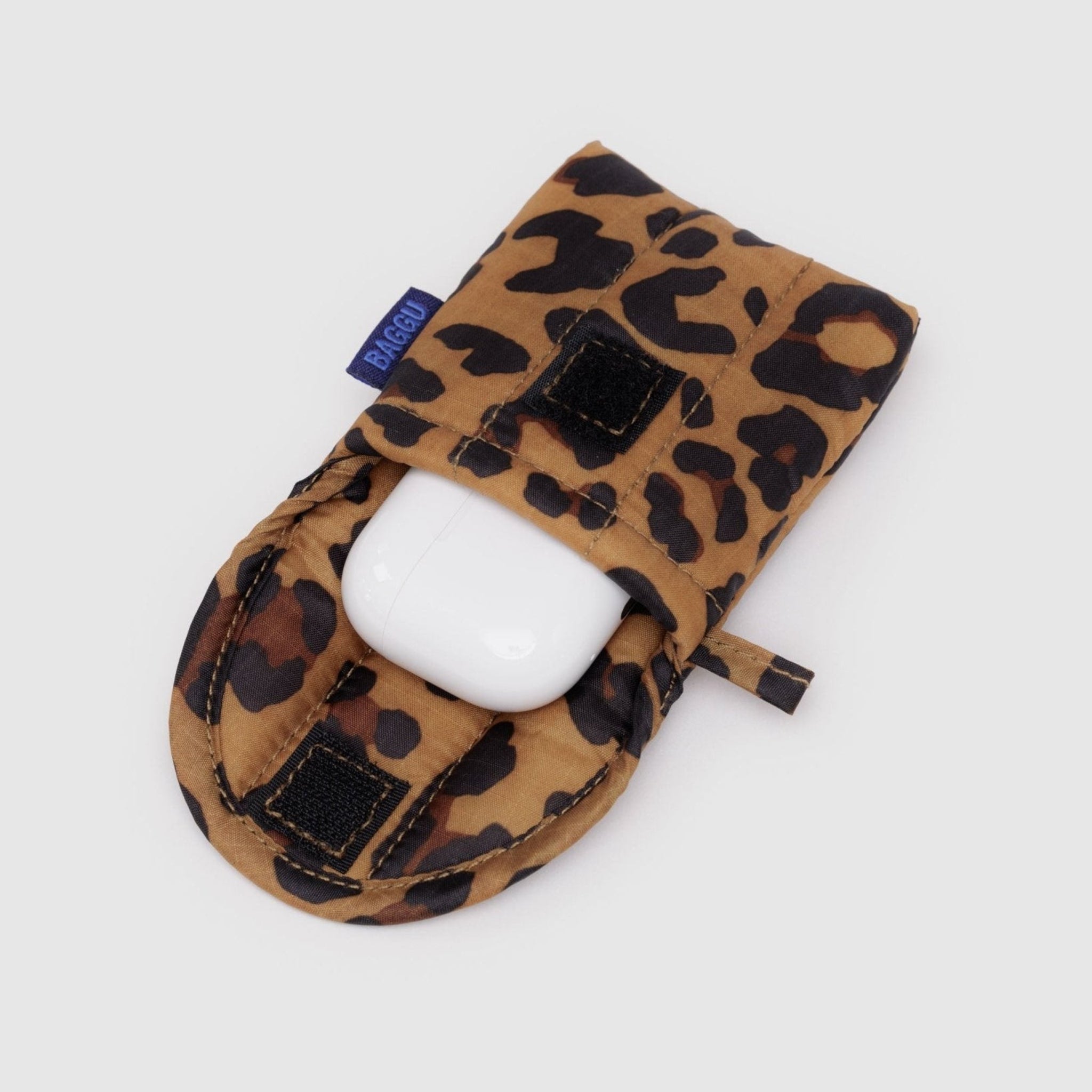 White plastic earbuds case inside leopard print quilted pouch with velcro closure - ANNIE.G