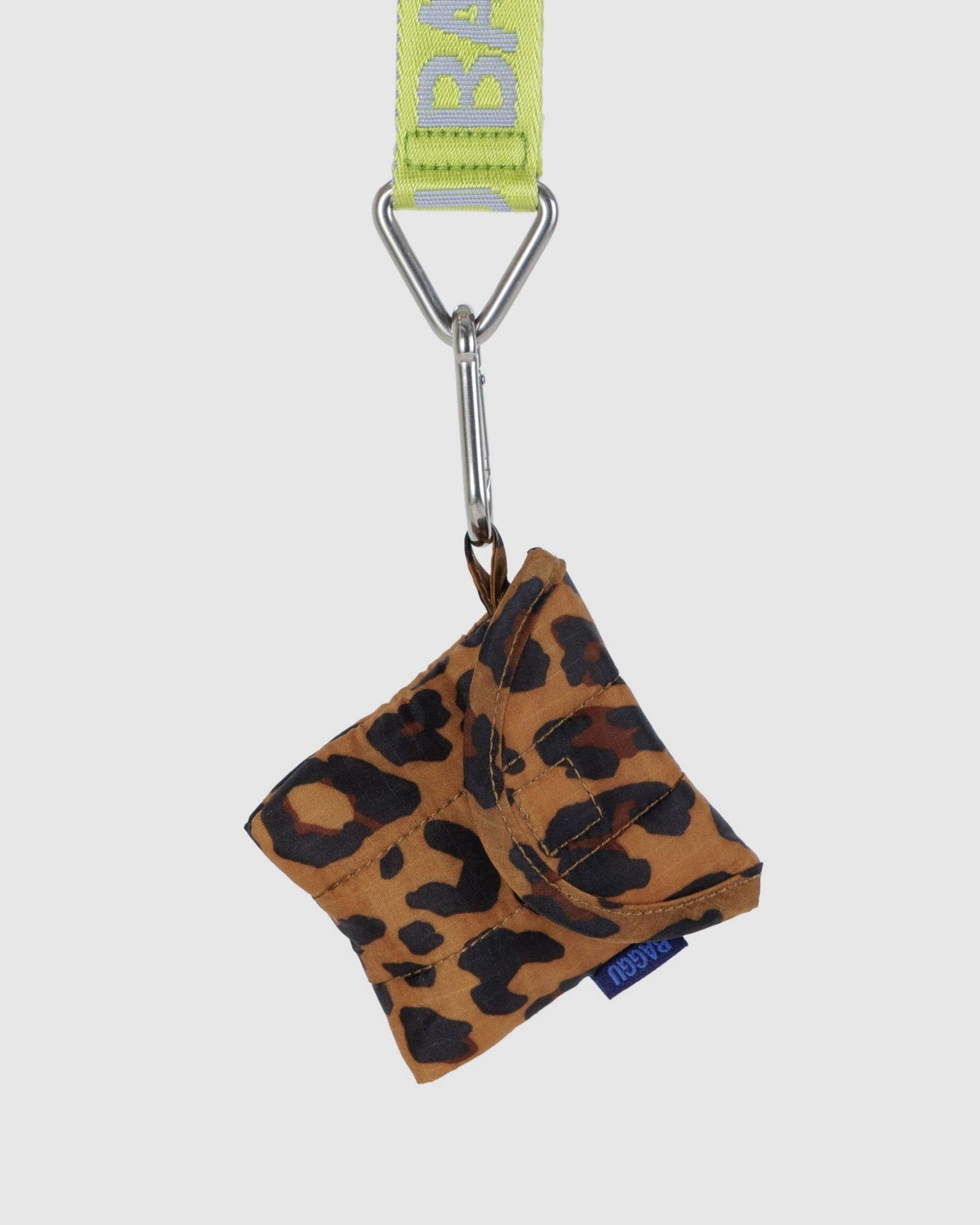Citron 'Baggu' logo keychain attached to hanging loop of leopard print earbuds pouch - ANNIE.G