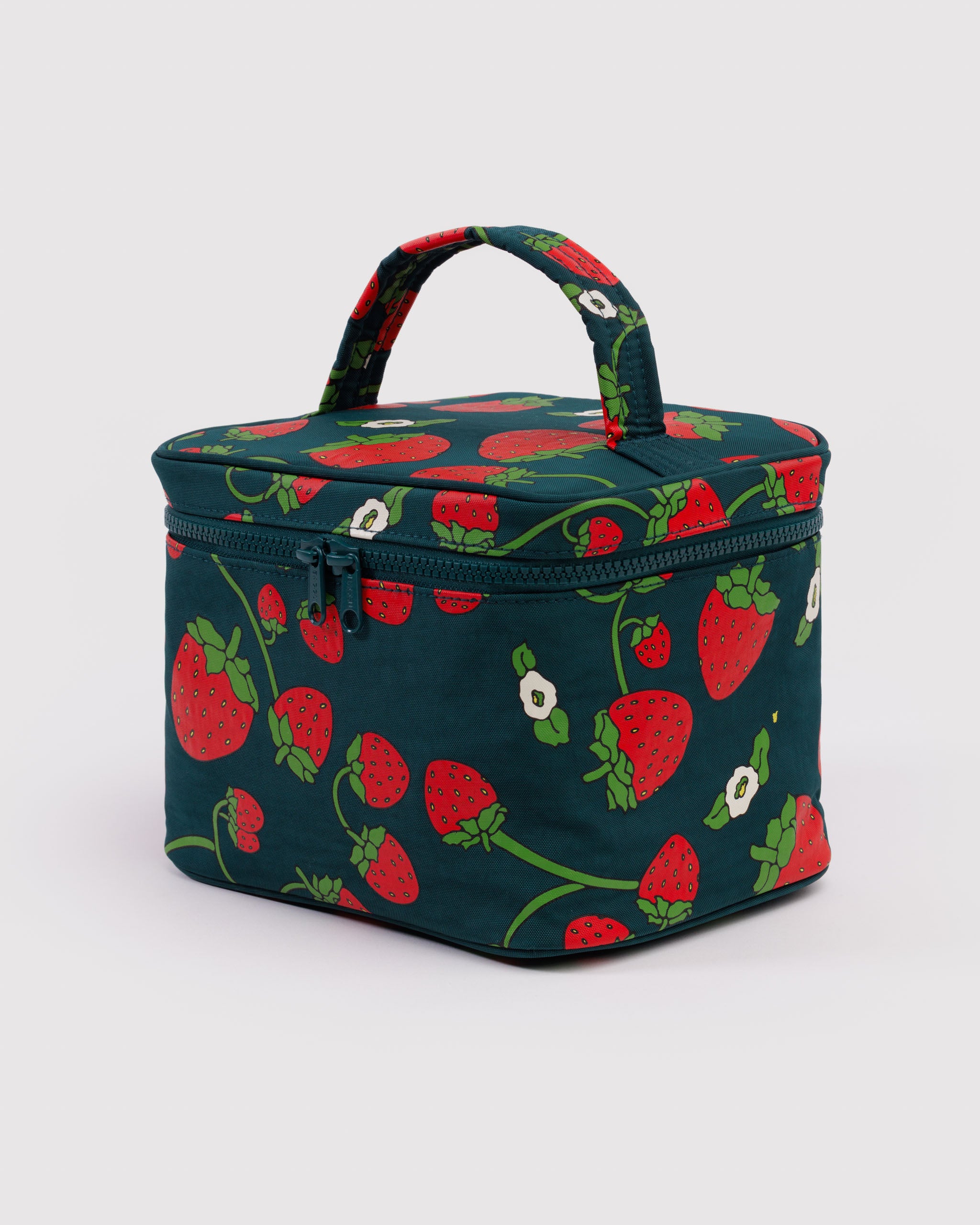 Green cosmetic bag with strawberries and flower pattern, zip top with carry handle.