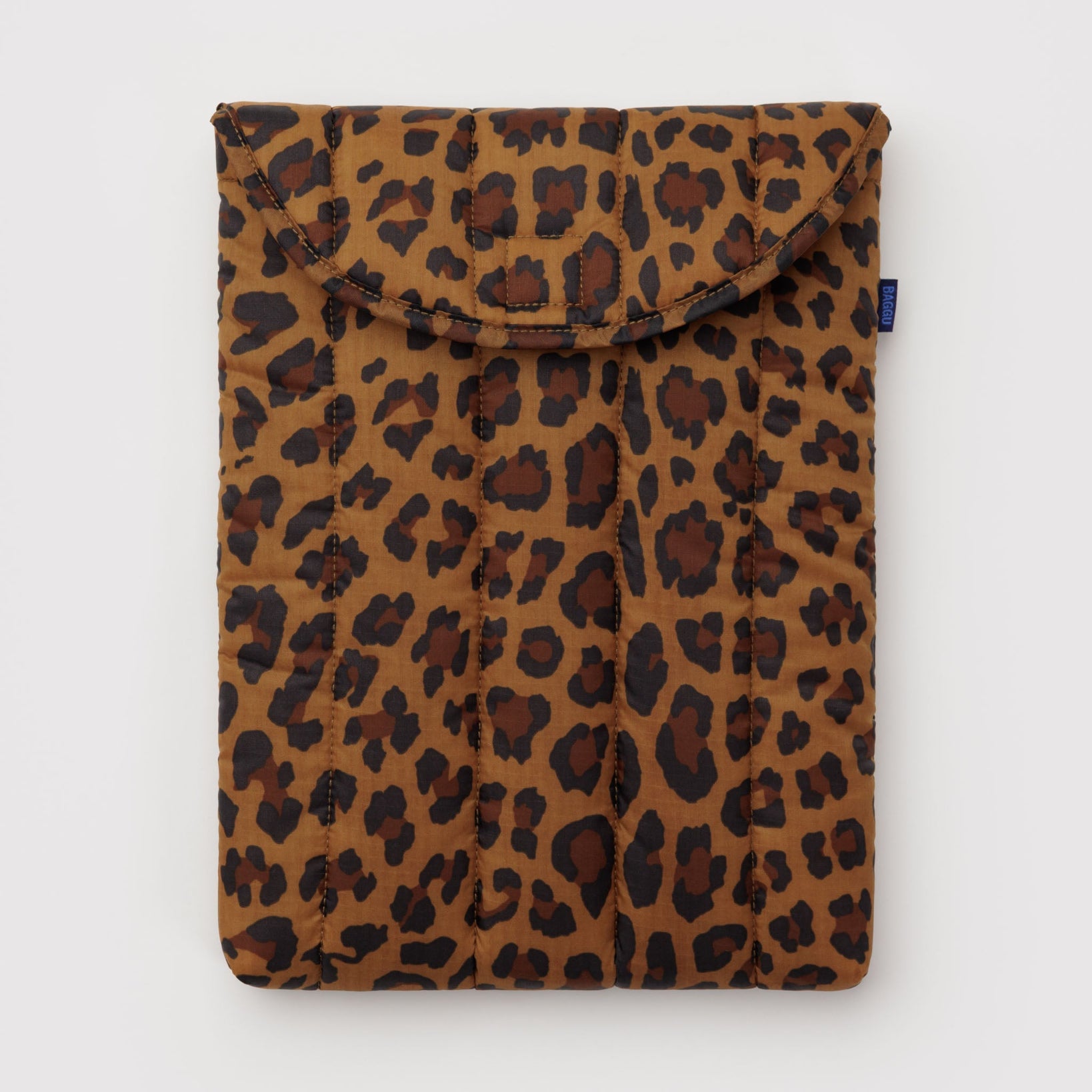 Quilted and puffy leopard print laptop pouch with velcro lid closure.