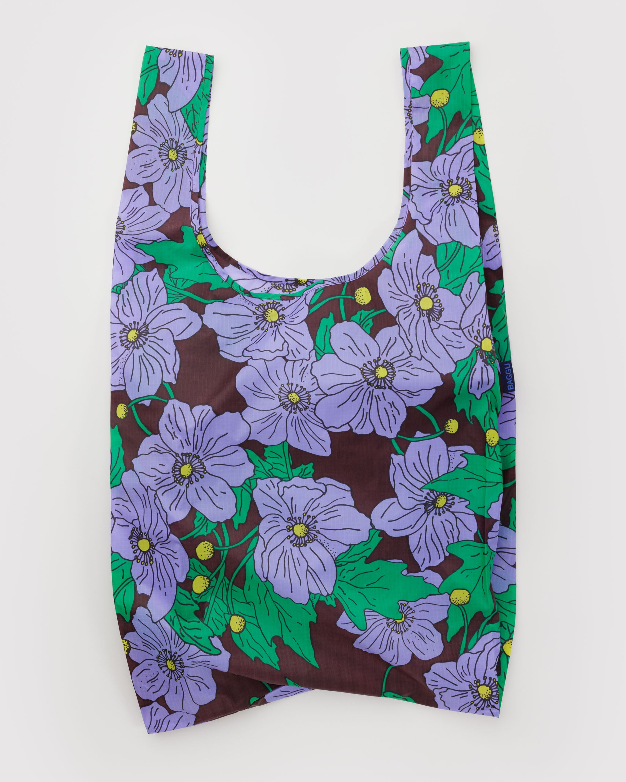 Reusable bag with purple poppy pattern and maroon background.