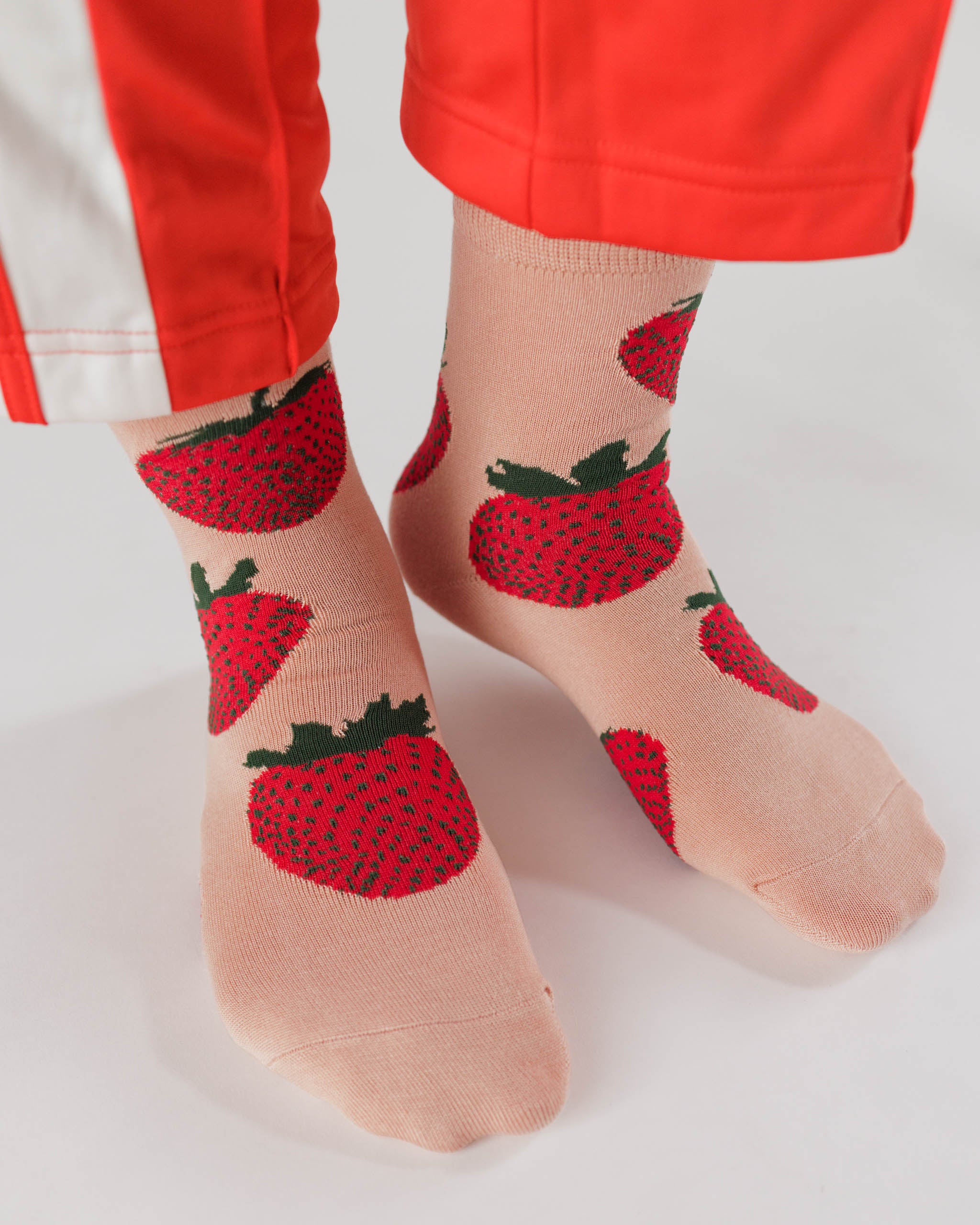 baggu-crew-socks-in strawberry-bamboo-knit-worn-on-feet