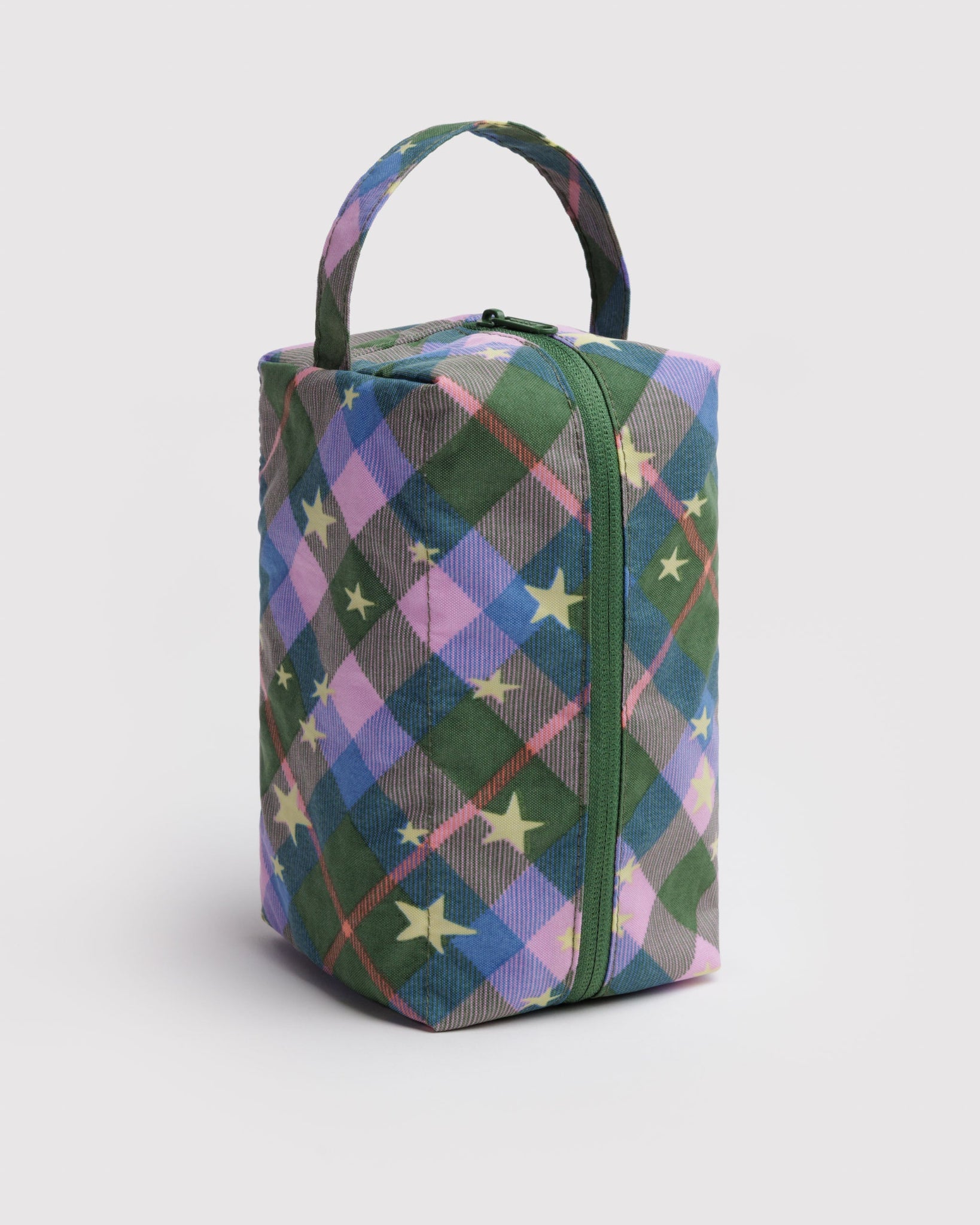 Green and pink plaid checkered rectangular bag with star patterns, tonal zip and handle.