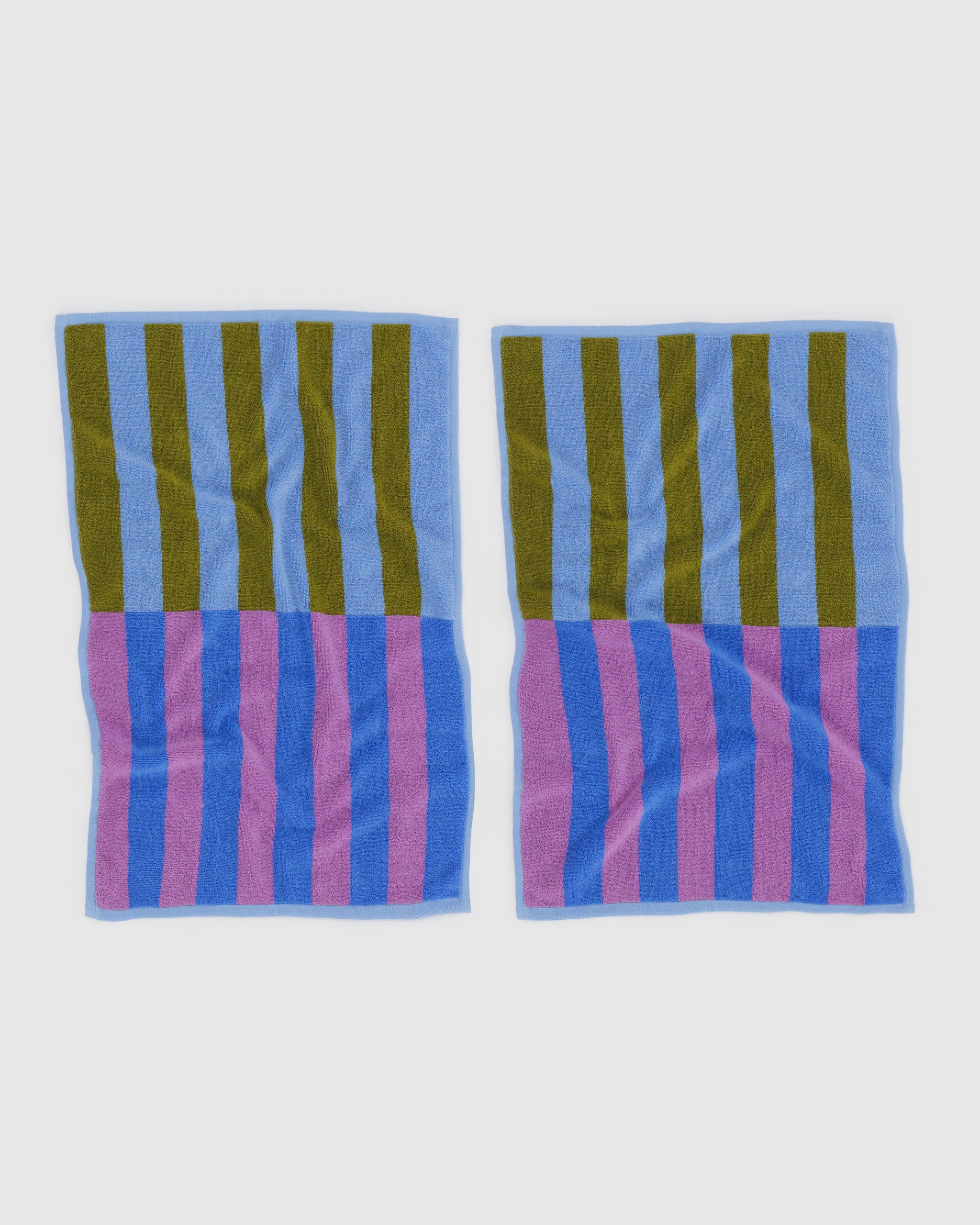 set-of-two-reversible-striped-hand-towels-pink-blue-and-green-front-pictured-flatlay
