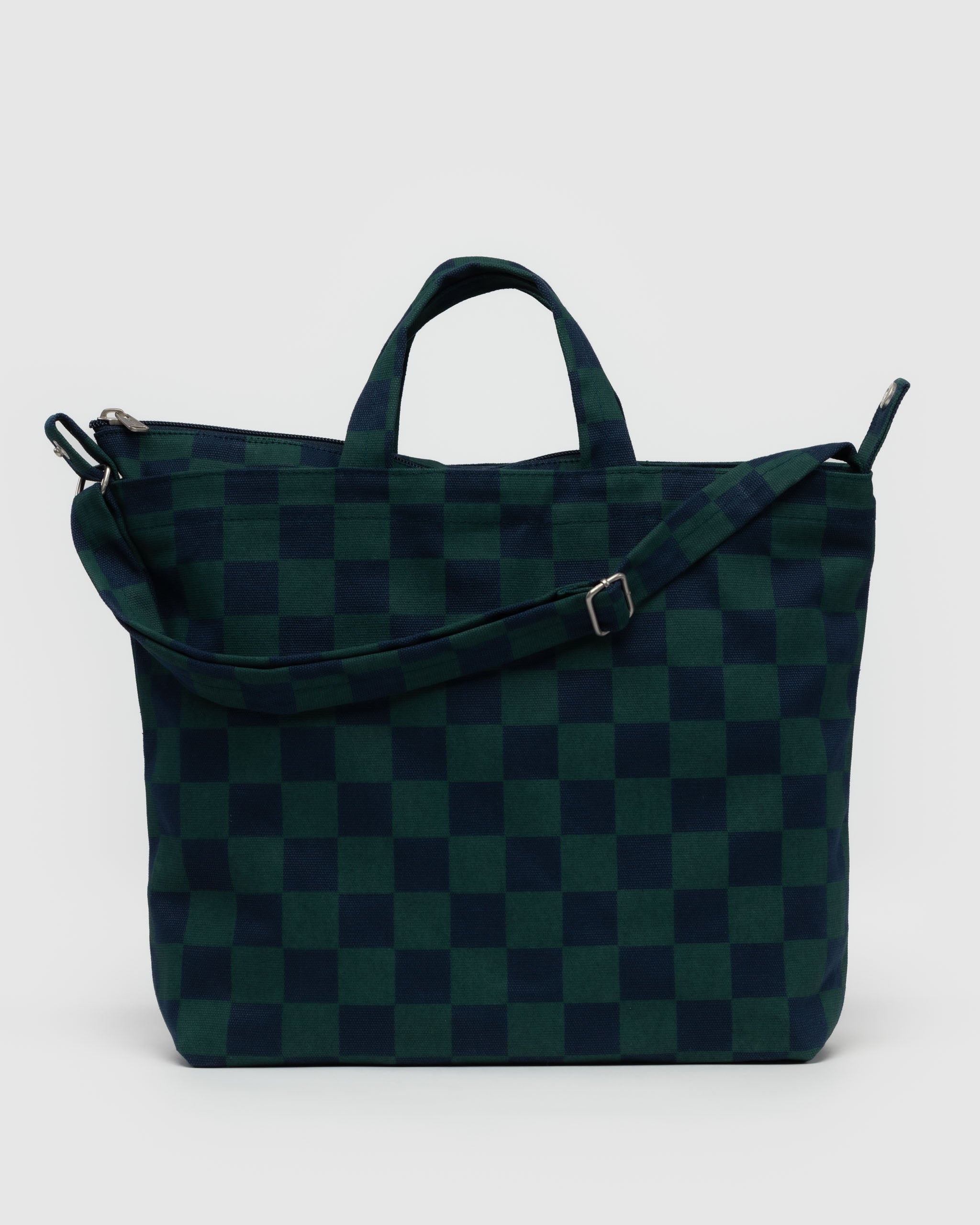 zipper-at-top-closed-on-wide-canvas-tote-navy-green-check-bag-with-short-carry-handles-plus-long-adjustable-shoulder-strap-metal-hardware