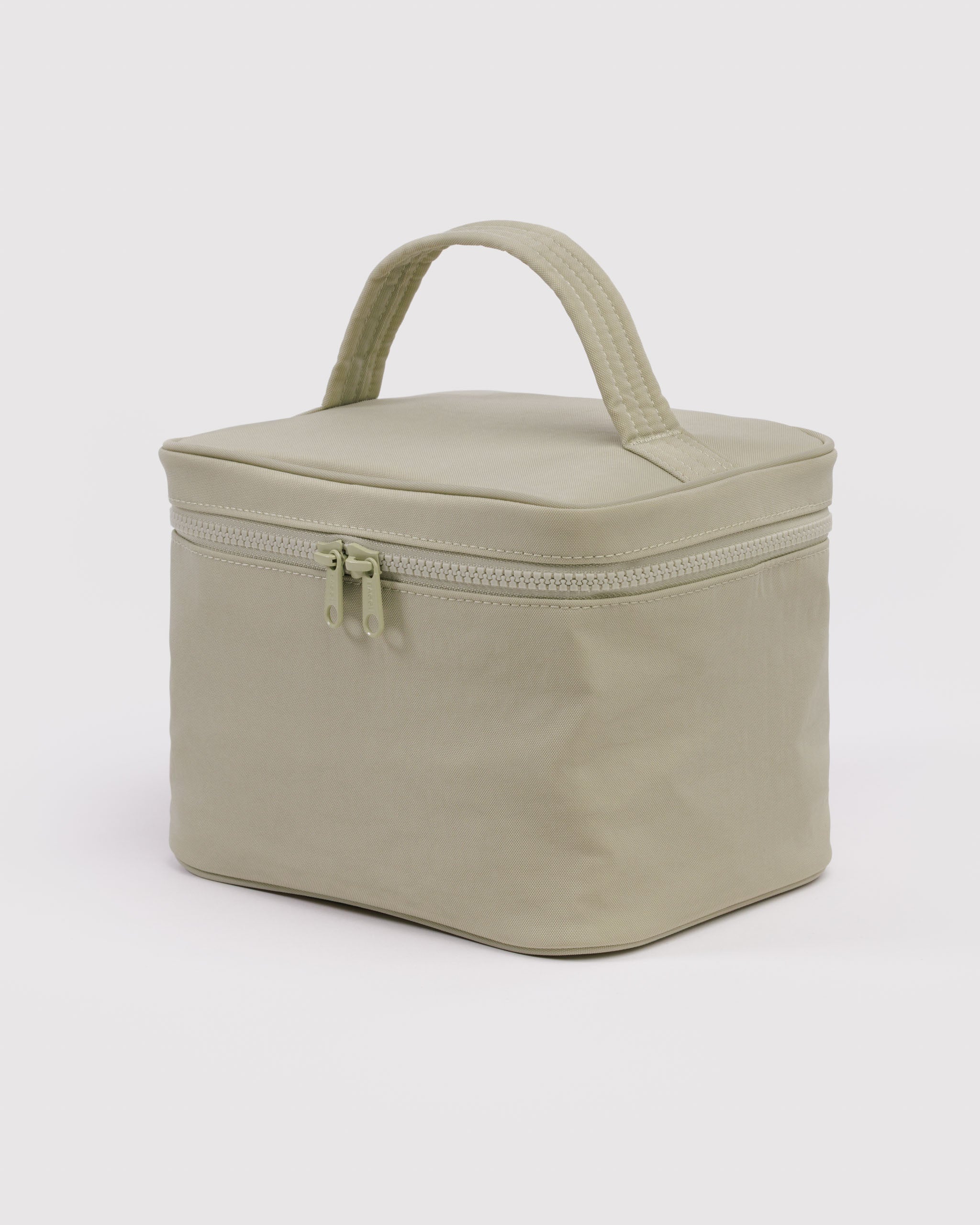 Light green cosmetic bag with handle and double zip top.