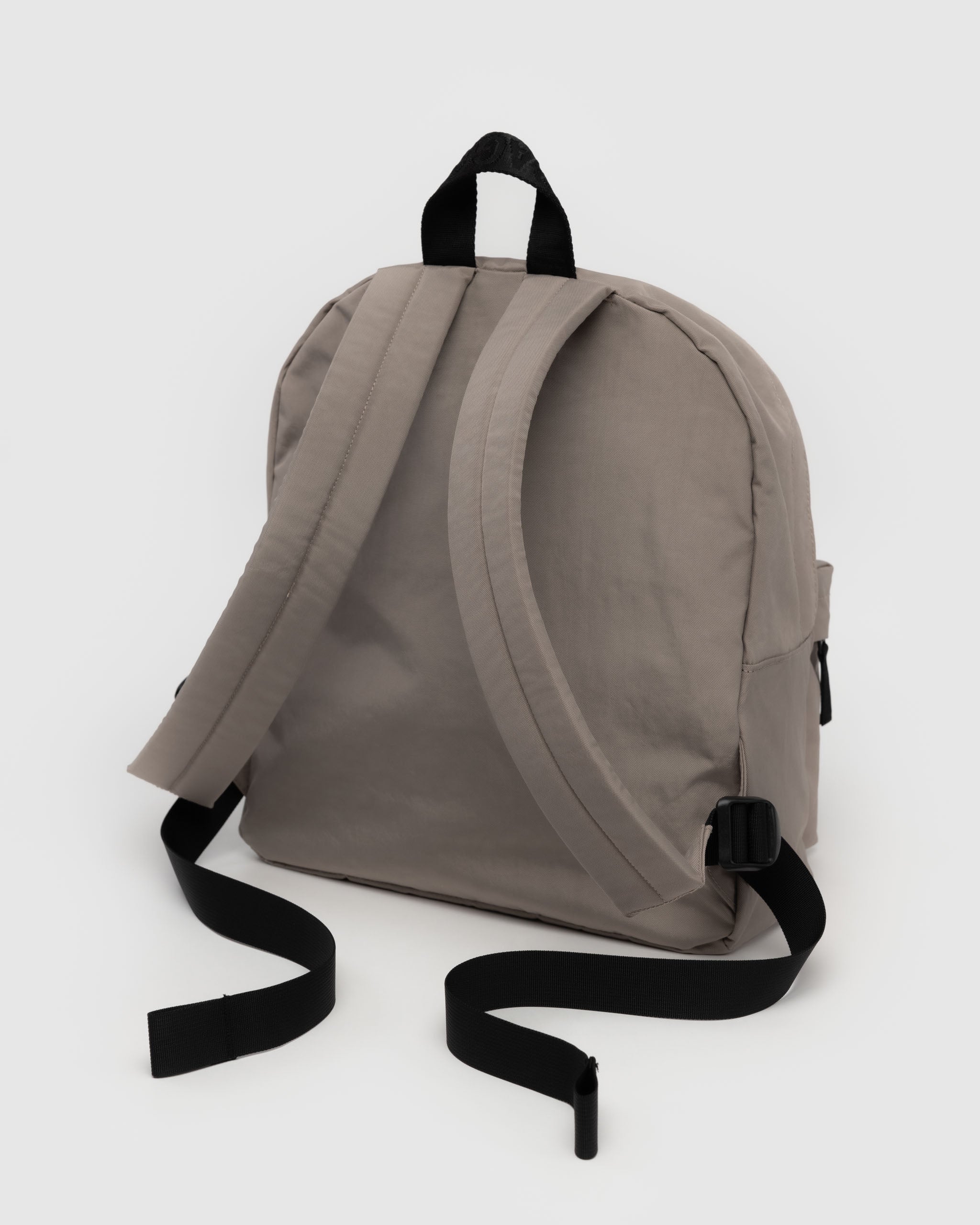 Dove backpack with tonal padded and black adjustable straps and top carry handle