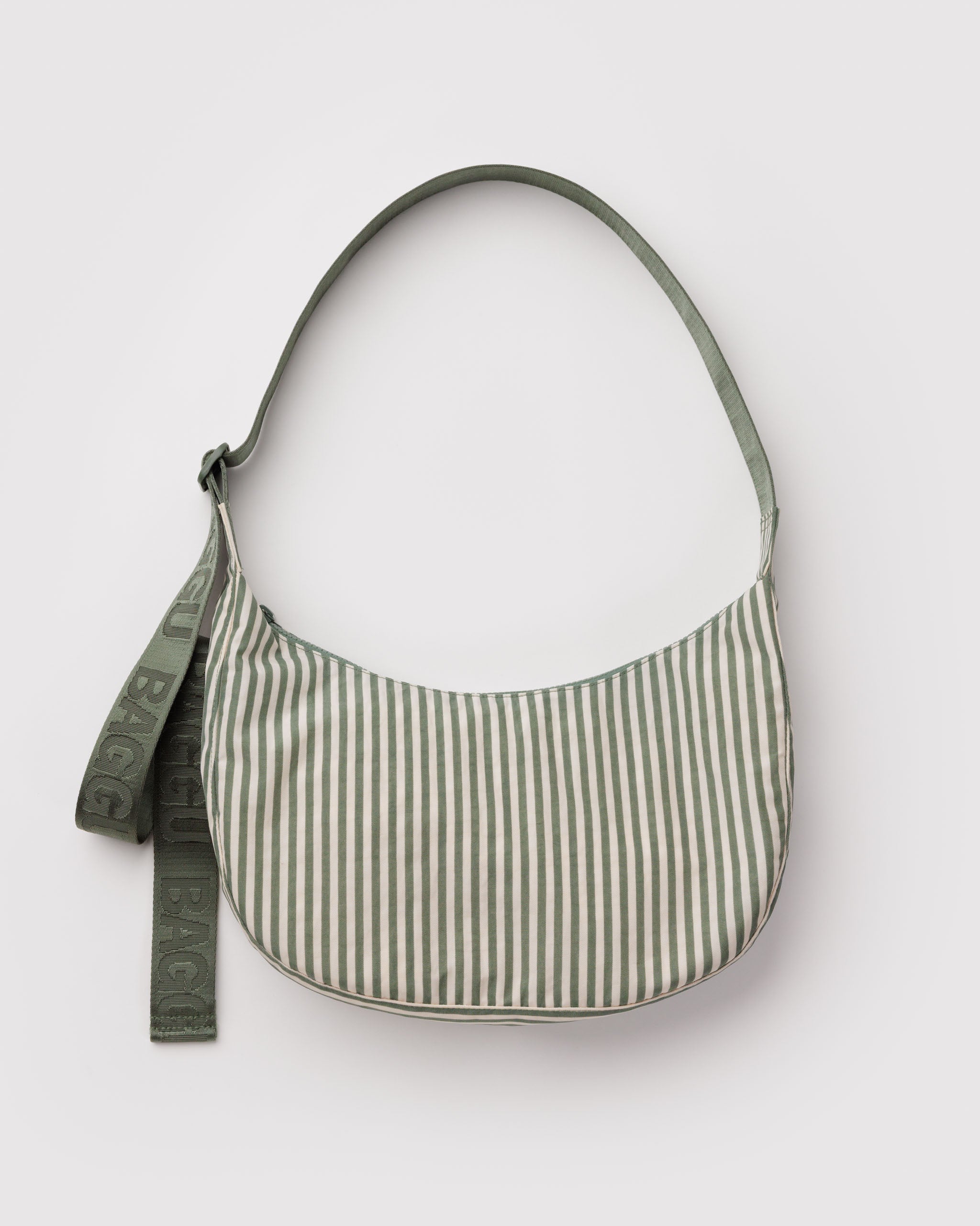Green and white striped shoulder bag with green adjustable strap.