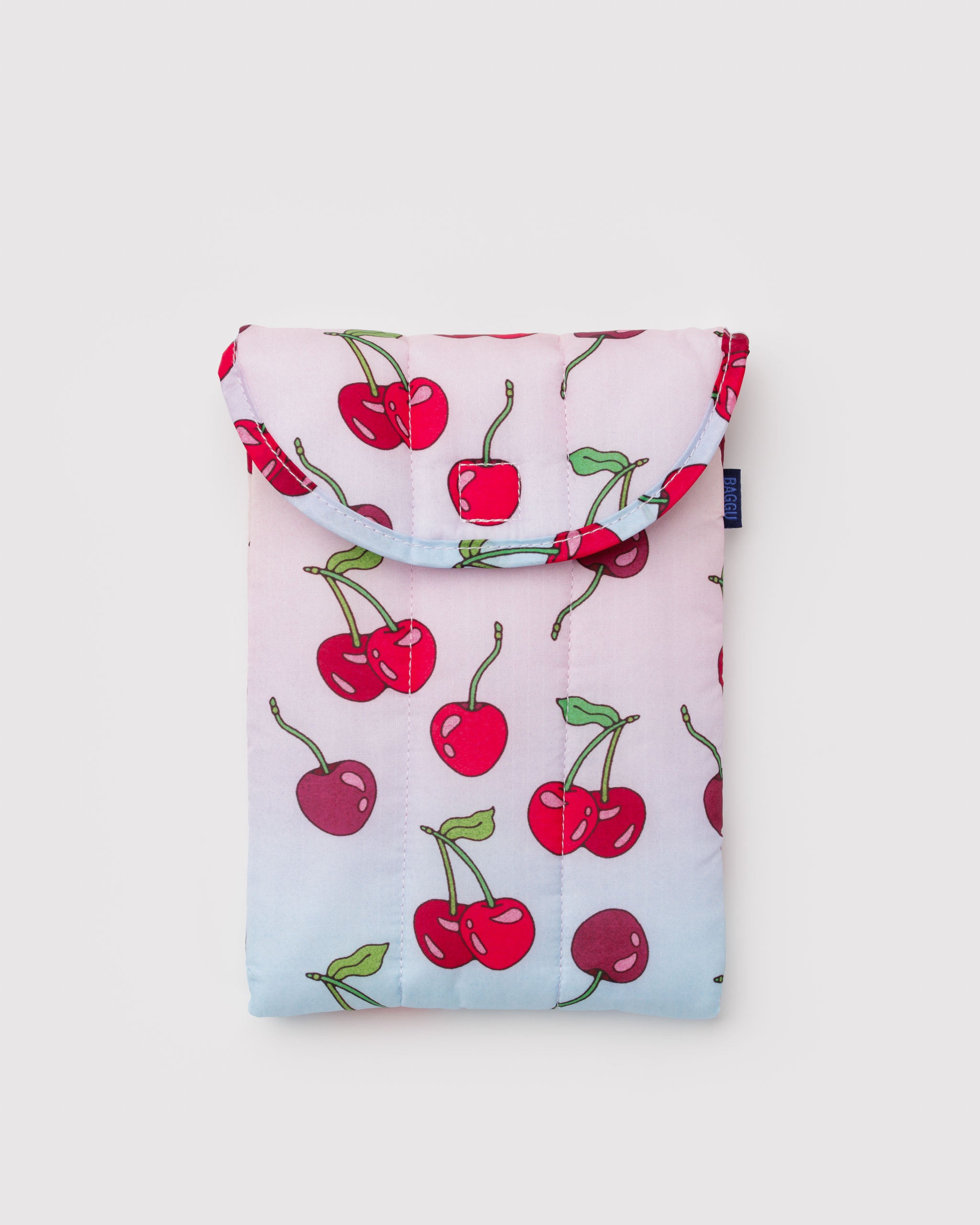 Puffy and quilted sleeve with cherry pattern and folded top.