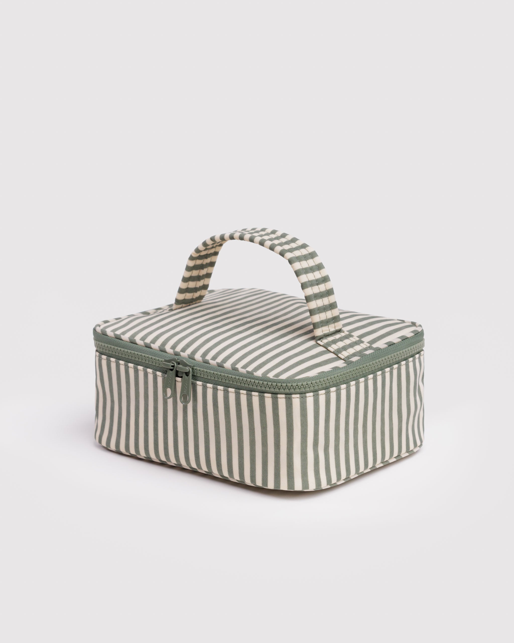 Striped green and cream fabric cosmetic case with a handle and tonal green zip closure.