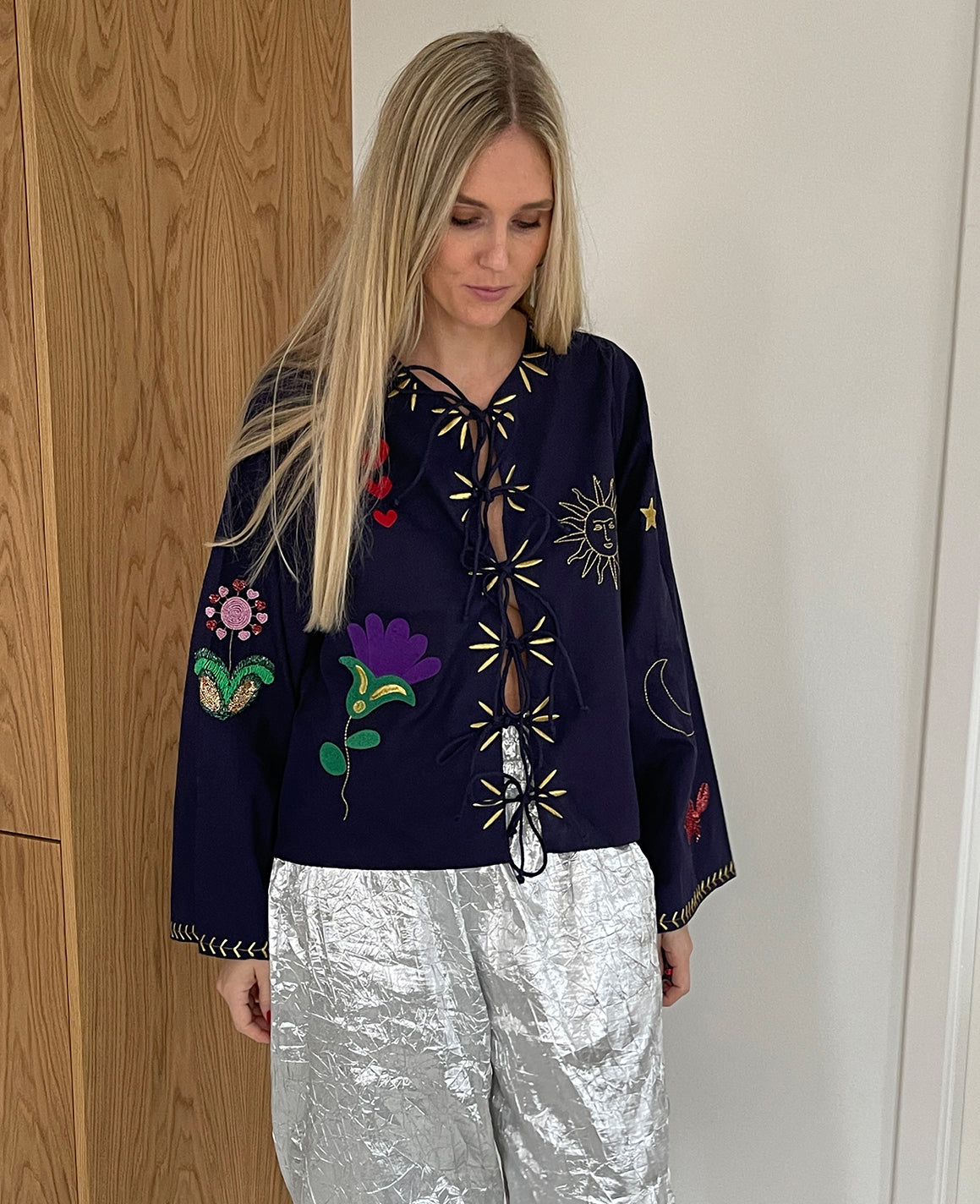 woman-wearing-sophie-top-ties