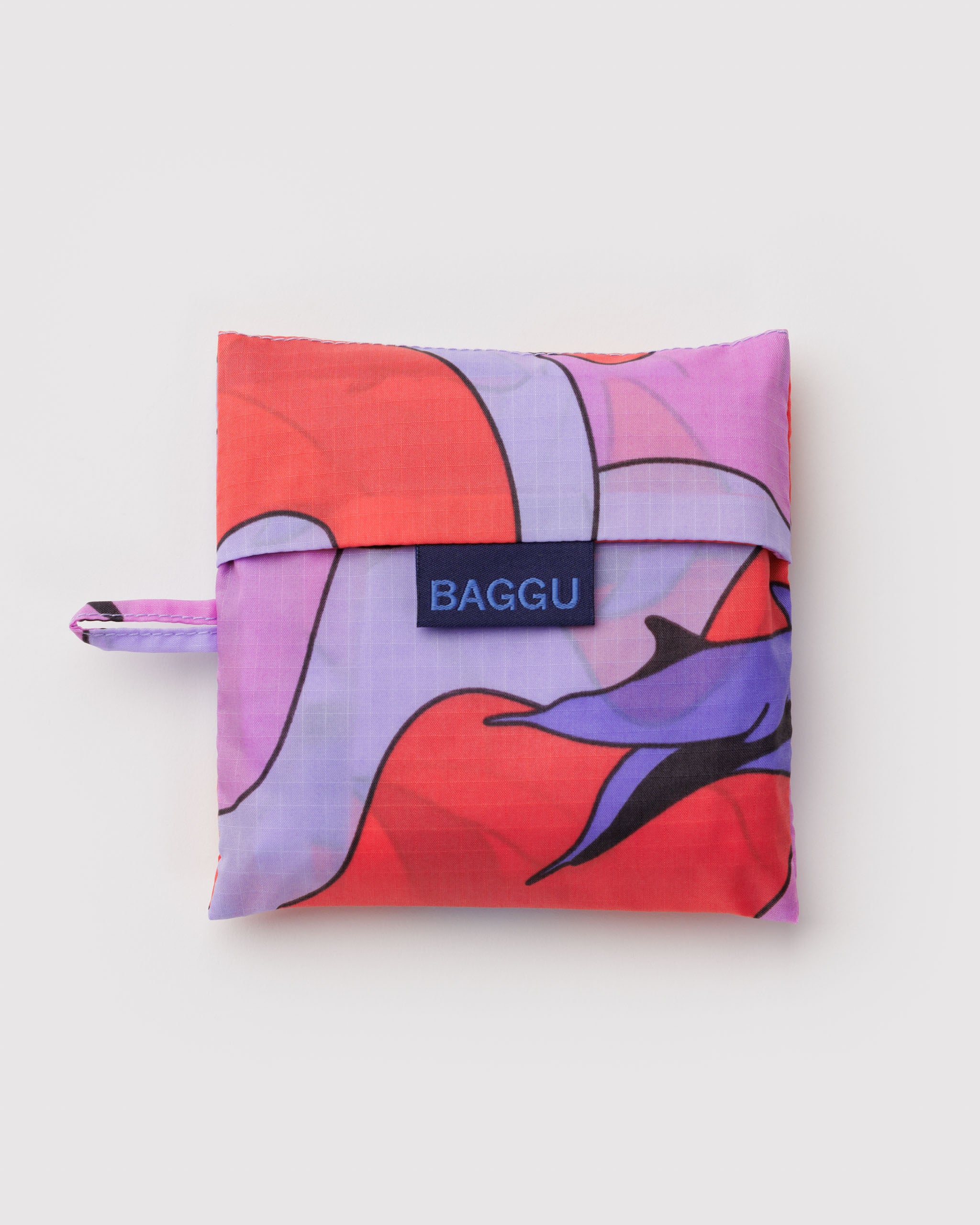 Colourful reusable pouch with dolphins and 'BAGGU' branding and hanging loop