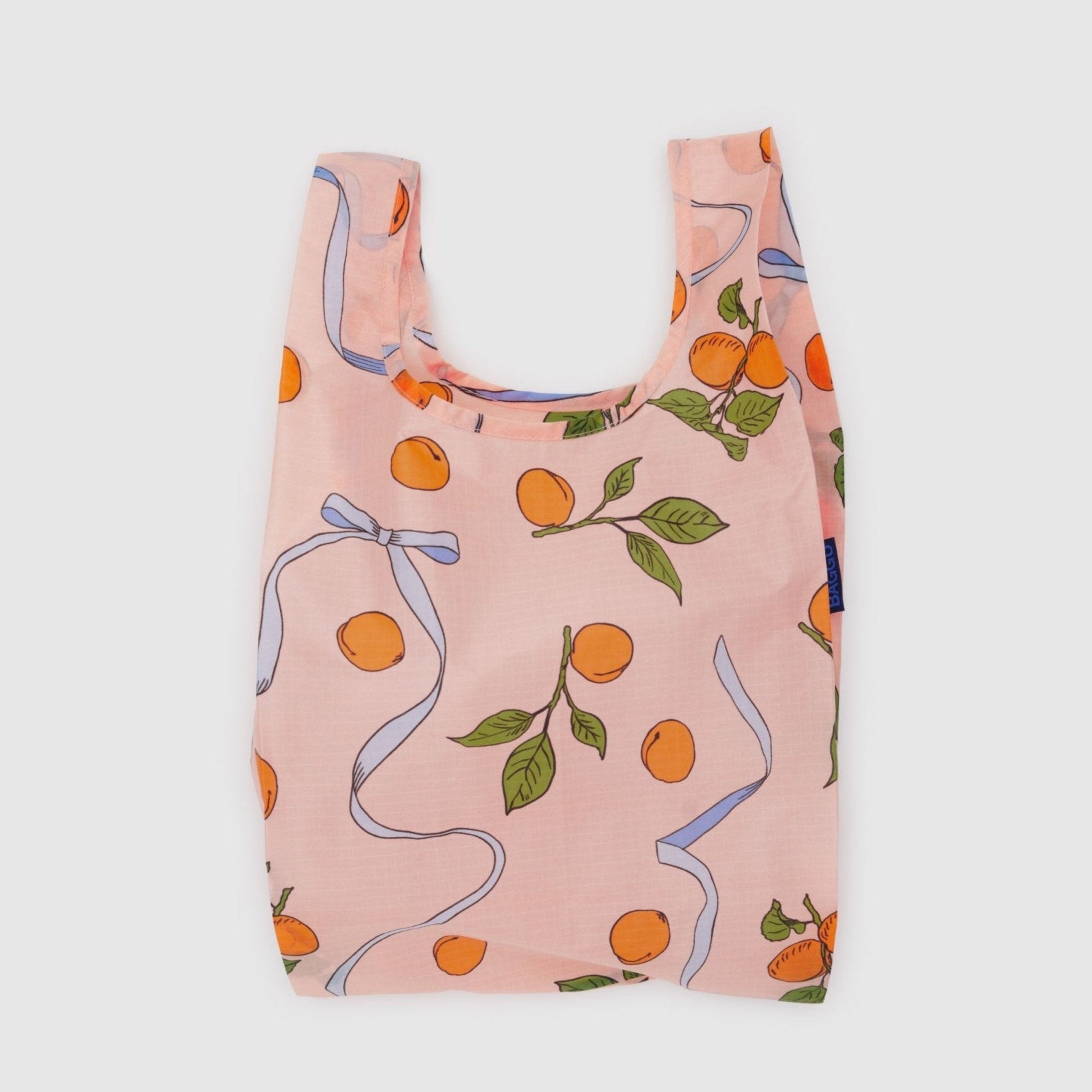 Light orange with apricots and blue ribbons print on Baggu Baby Baggu Reusable Shopping Bag - ANNIE.G