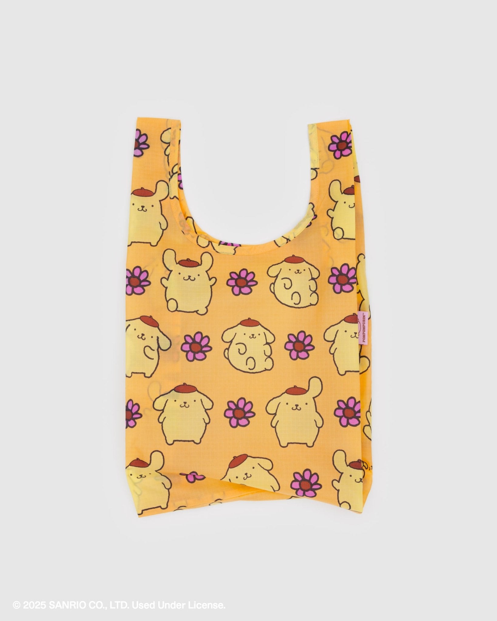 Yellow baby size reusable bag with print of a golden cartoon dog wearing a brown beret and pink flowers