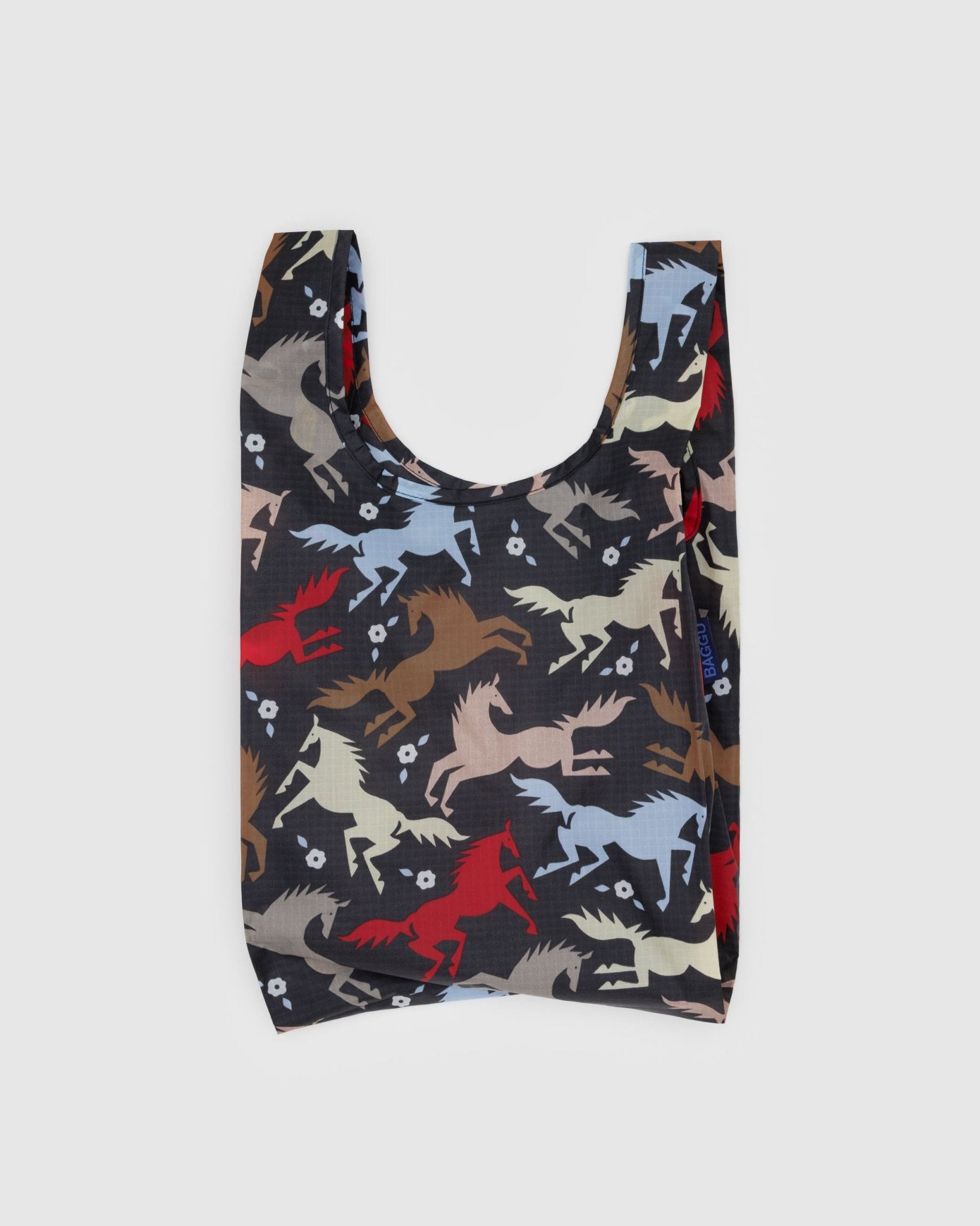 Baby size reusable shopping bag with coloured horses and white flower pattern on black