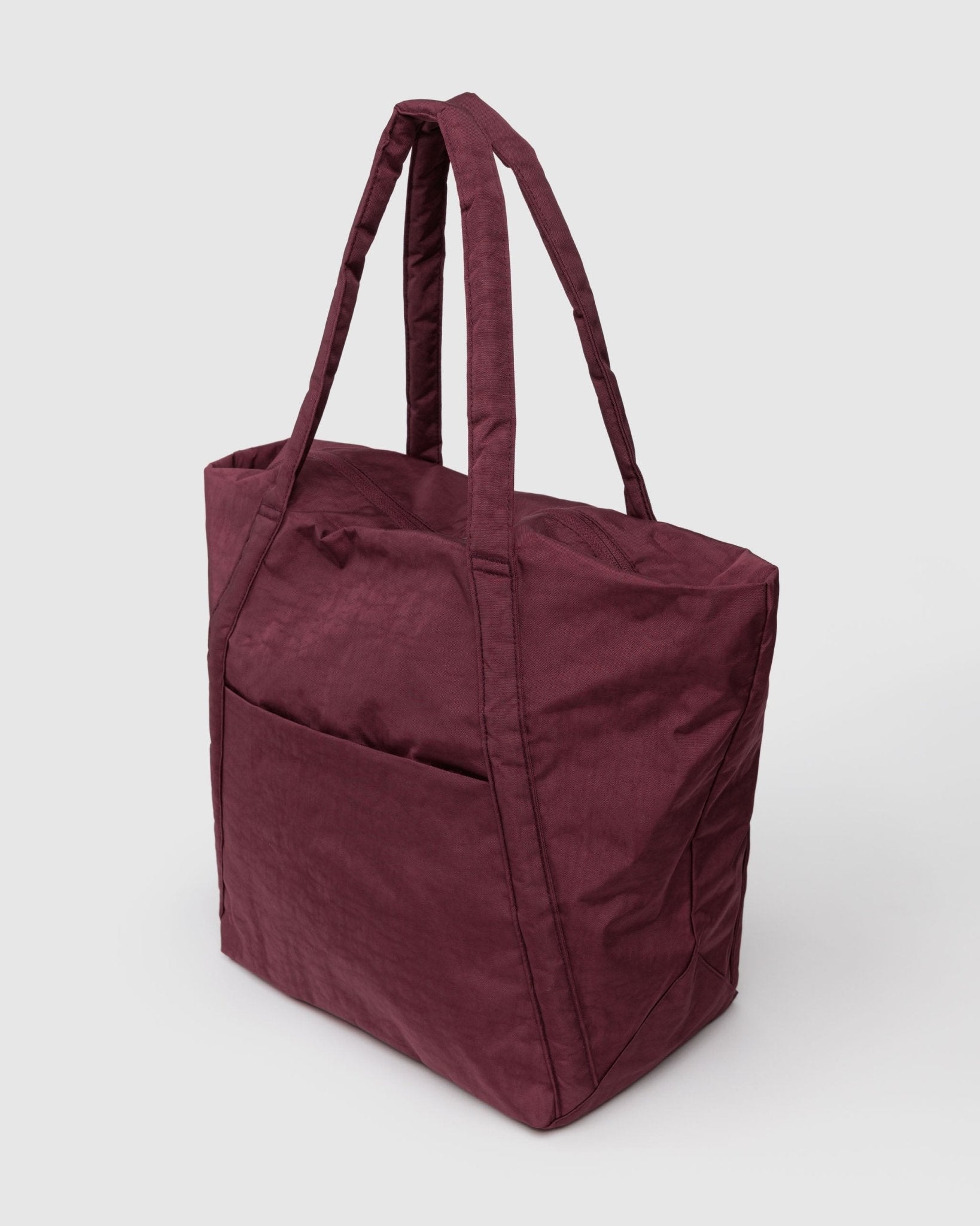 Maroon tote bag view from side and zip top