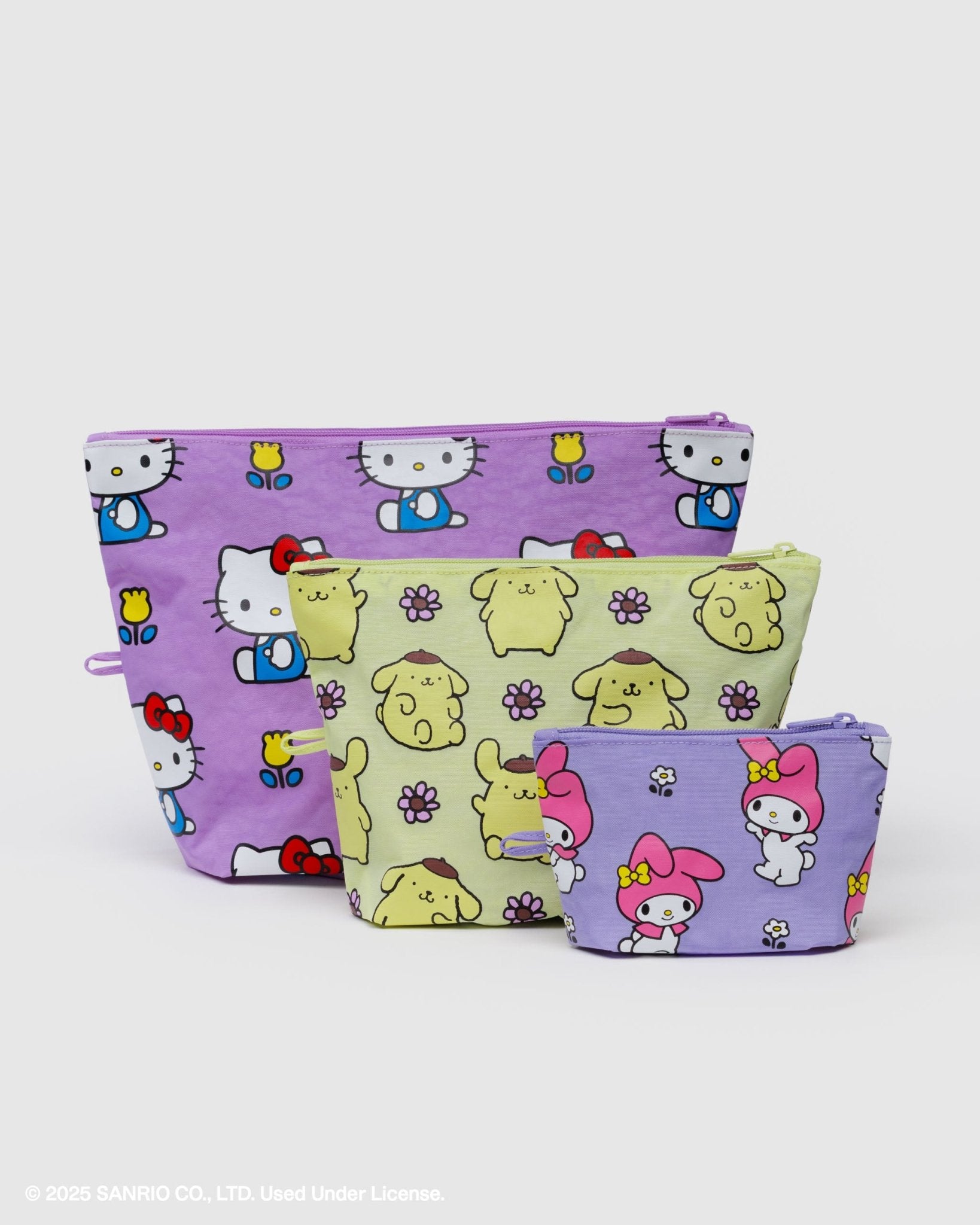 Three sized pouches with hello kitty and friends character patterns and florals with zip top and expandable bottom to stand upright