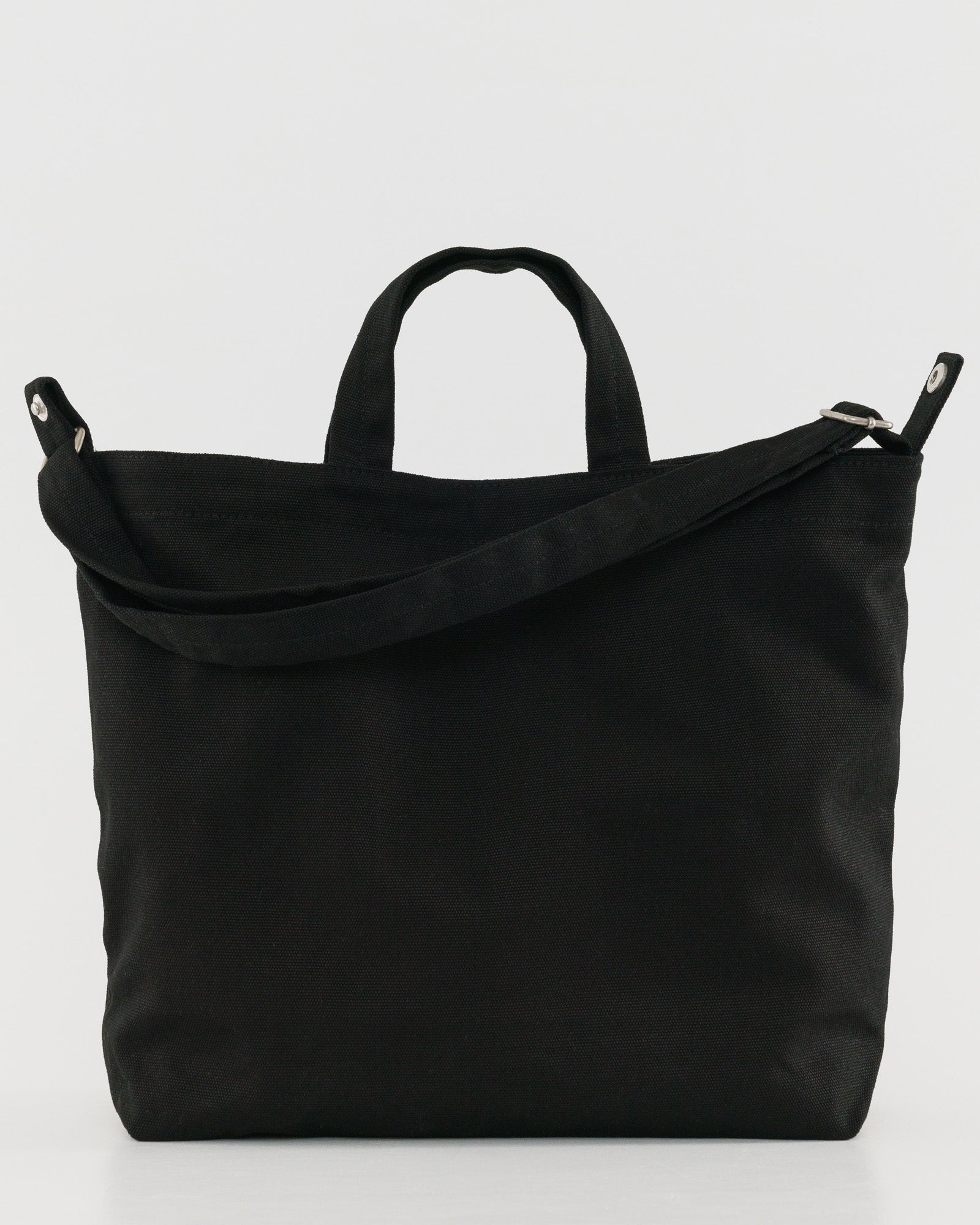 Black tote bag with shoulder strap and short handles