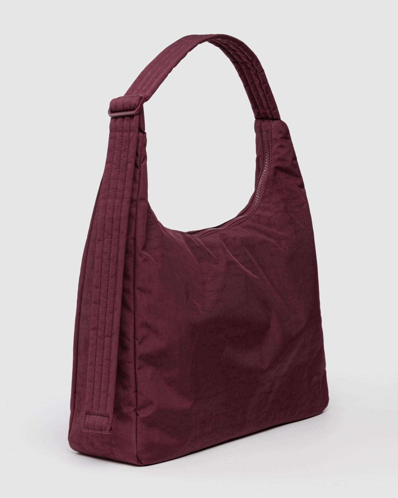 Maroon handbag zip top and adjustable strap