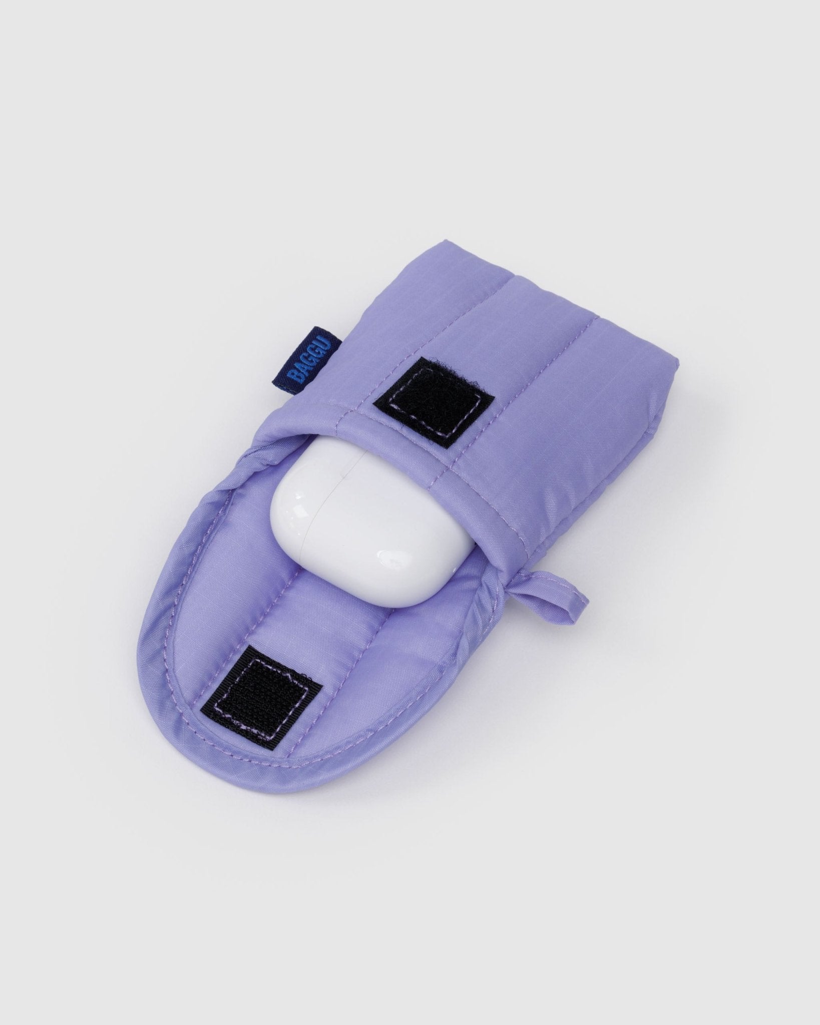 Purple earbuds pouch with white airpods inside, velcro closure and loop for hanging