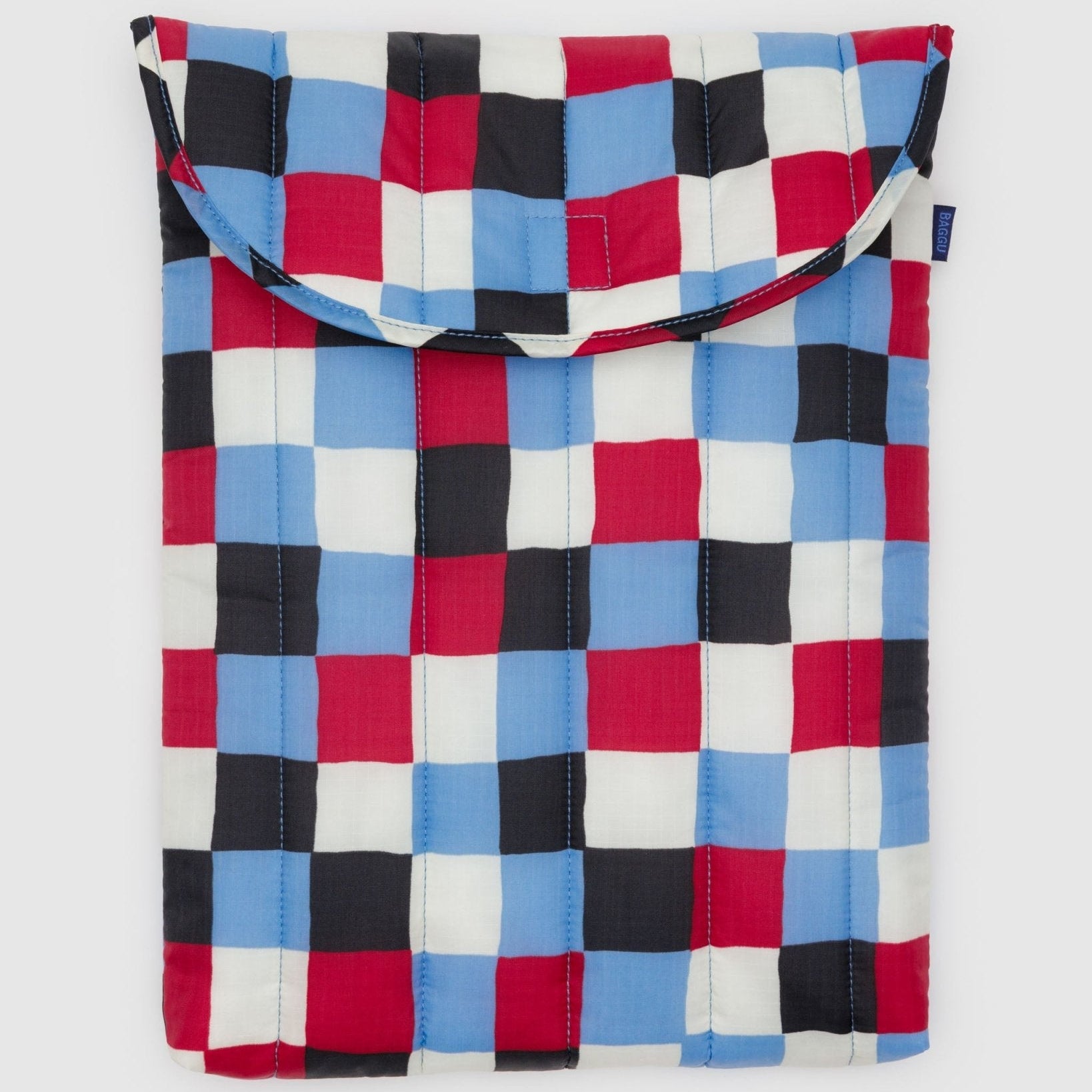 Checkered bag with red, blue, and black pattern