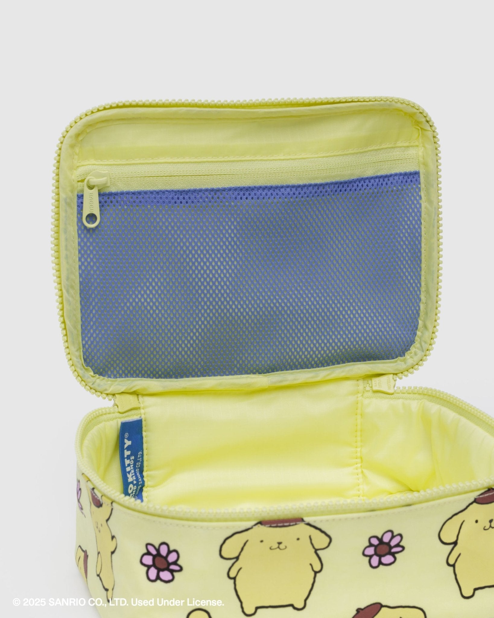 Yellow small cosmetic case with floral and character pattern print and internal blue mesh zip pouch on lid