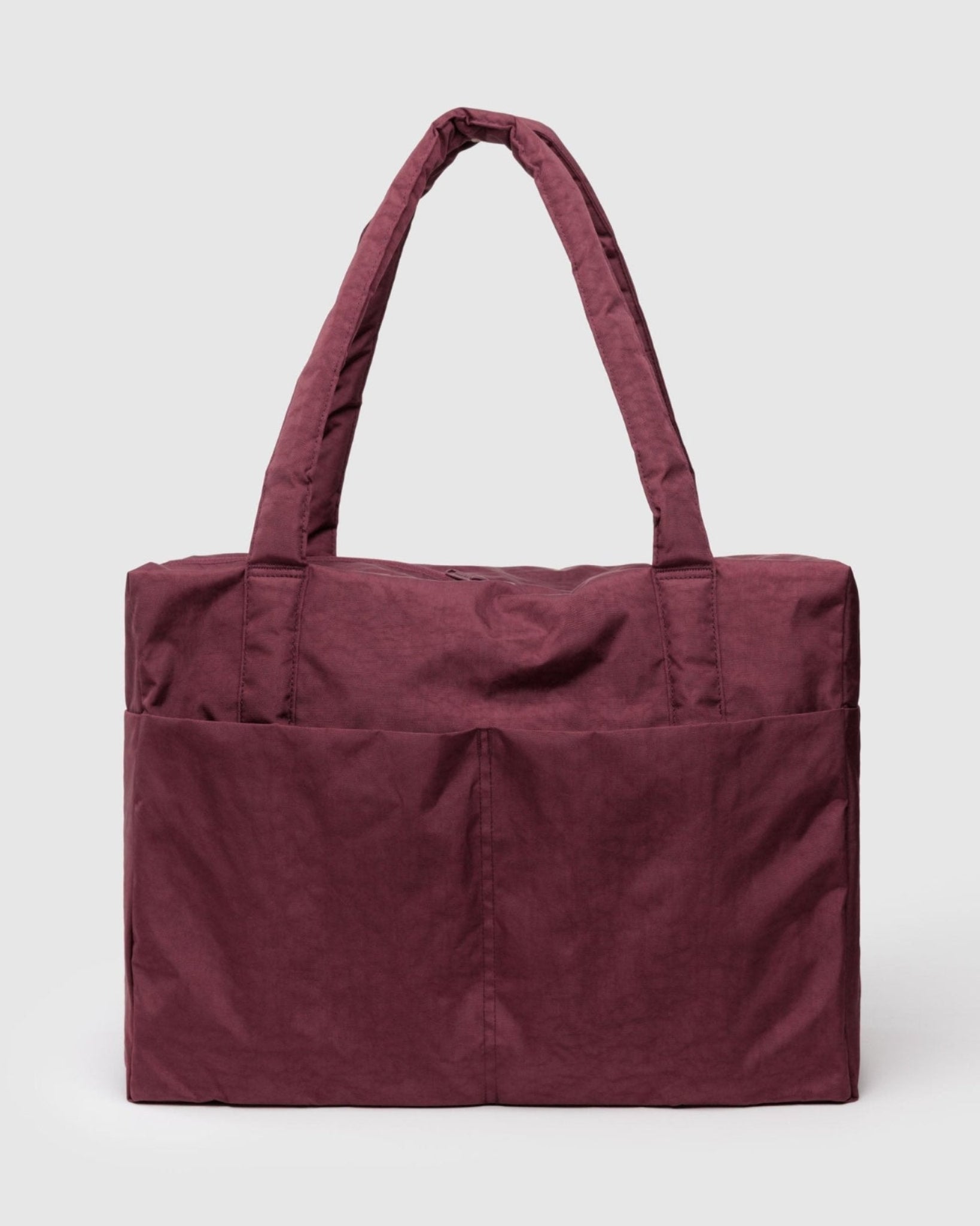 Mahogany duffle bag with carry handles and two external pockets, zip top.