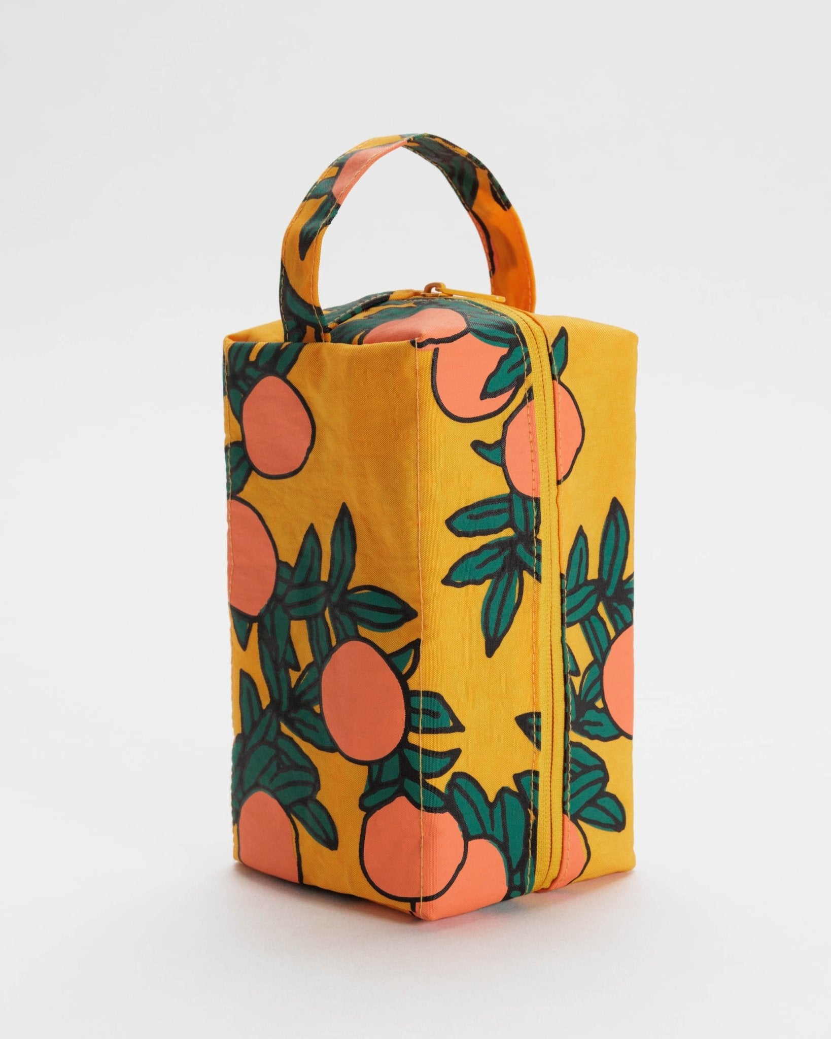 Orange bag with oranges and green leaves pattern with top zip and carry handle.