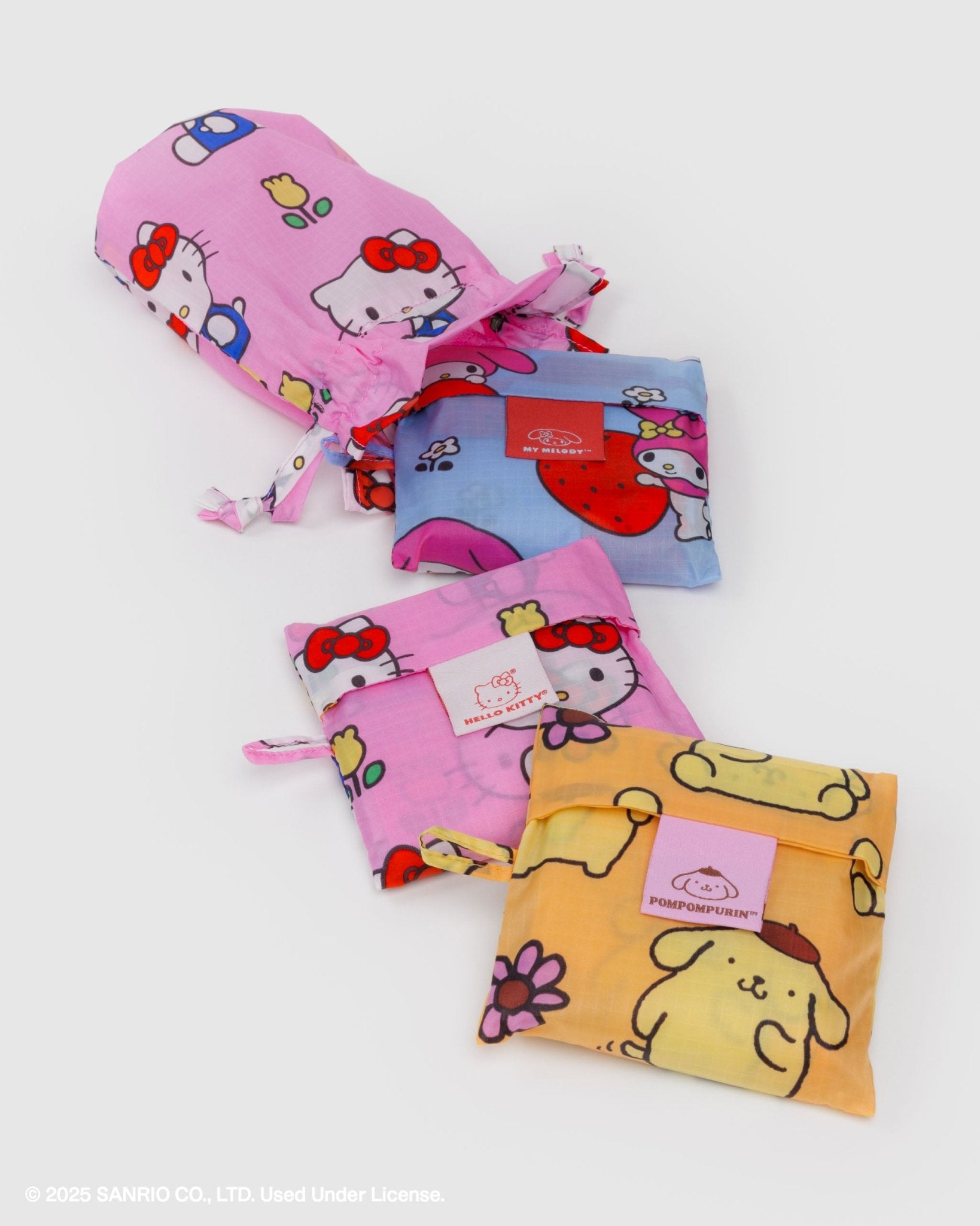 Set of colorful pouches with cartoon characters on a white background
