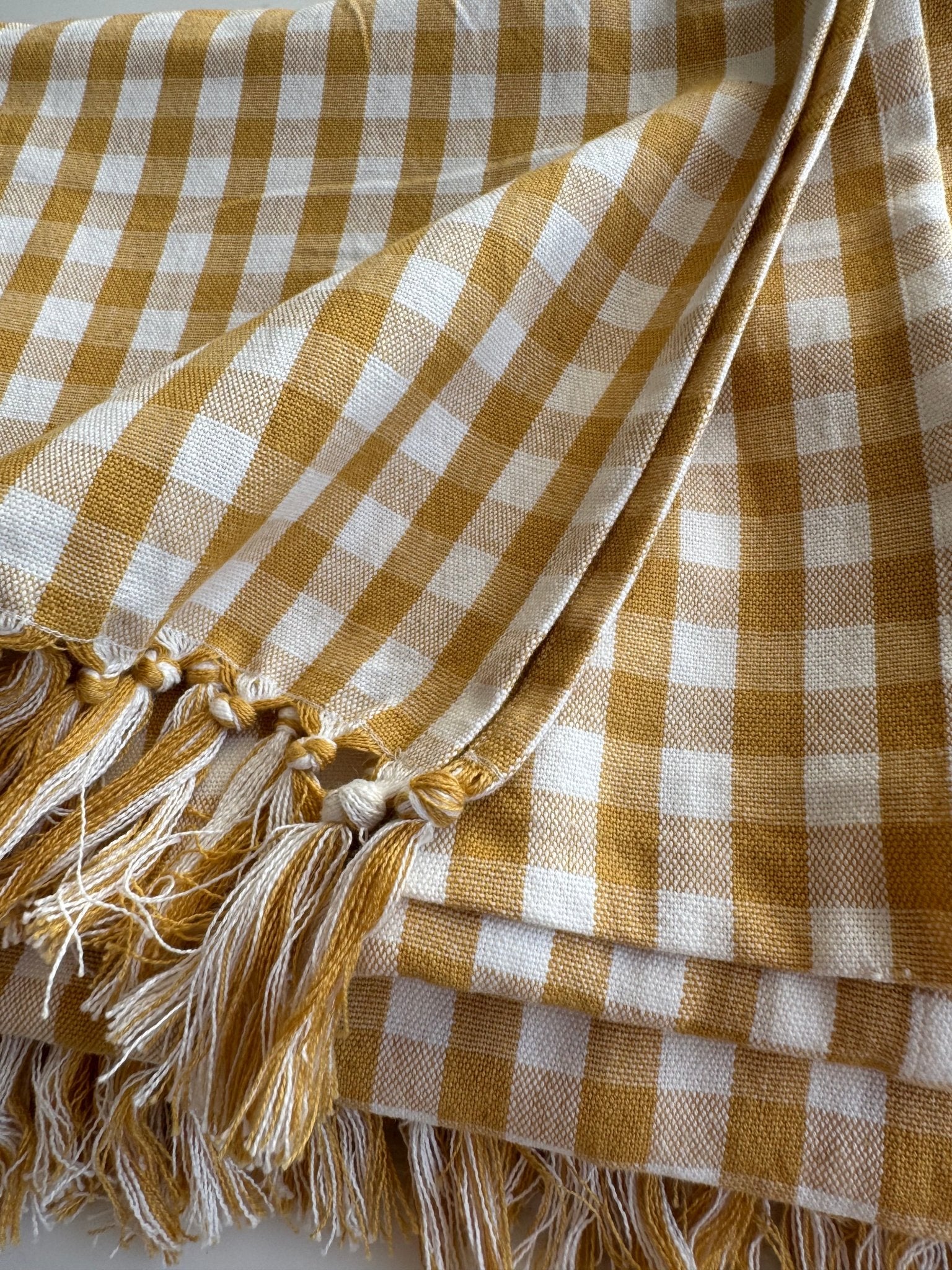 Hand knotted tassel edge of Gold Gingham Cotton Tablecloth - ANNIE.G