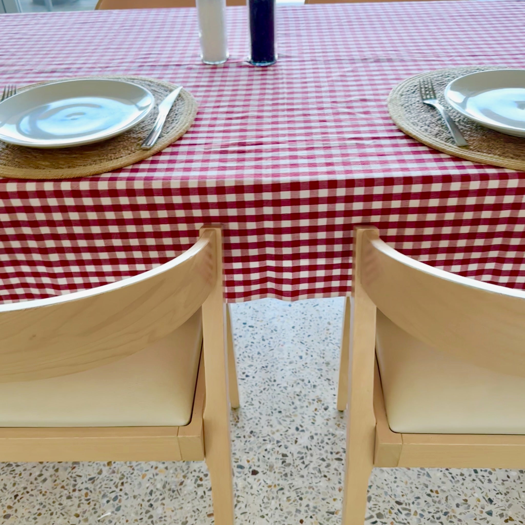 Long edge of Red Gingham Cotton Tablecloth on set dining table - ANNIE.G