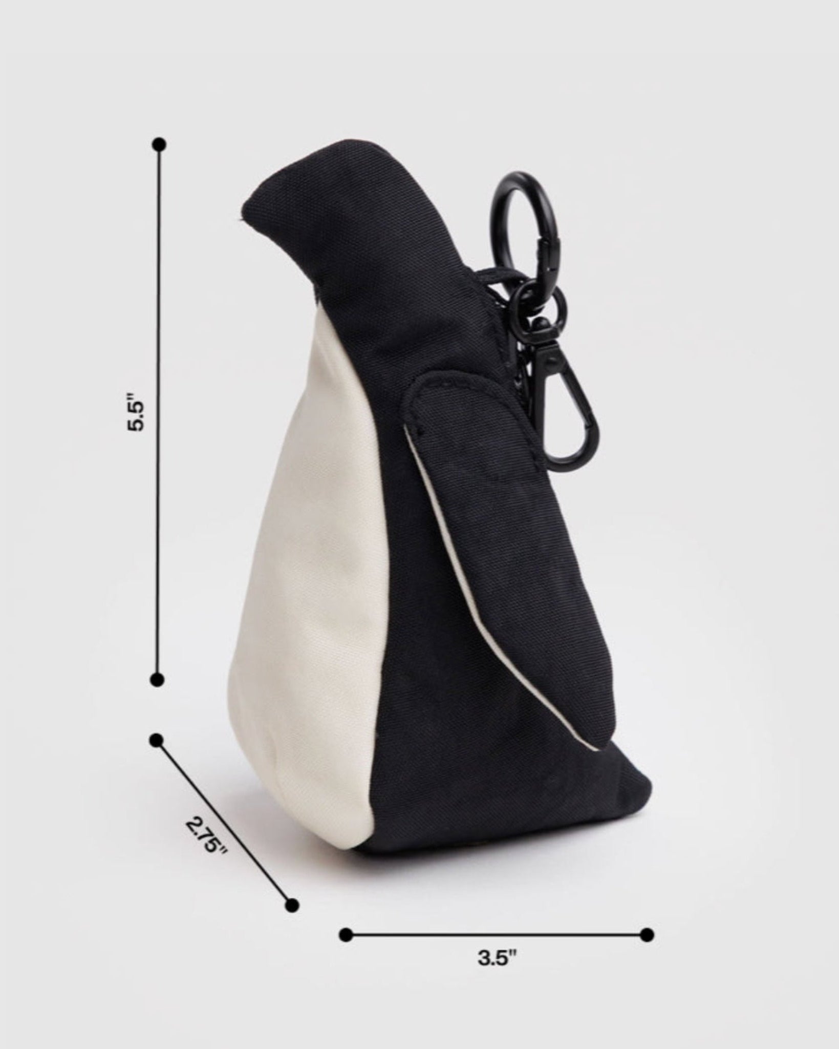 Measurements next to penguin bag charm.