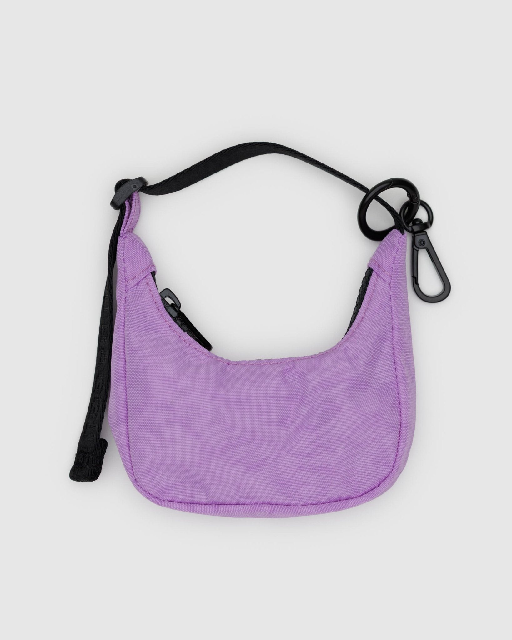 Crescent shaped bag charm in rose with adjustable black handle, zip and keychain.