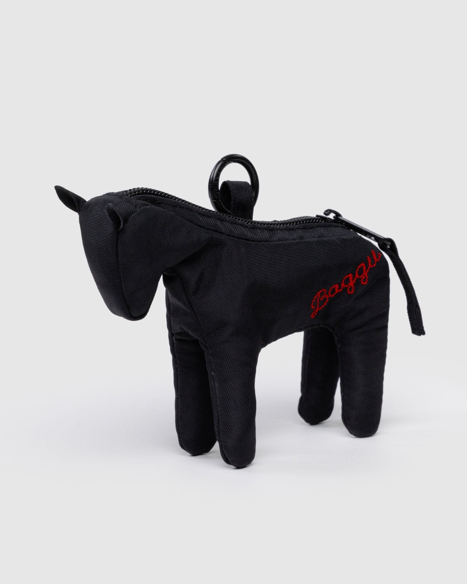 Black puffy horse bag charm with zip and metal clip with BAGGU branding embroidered on side.