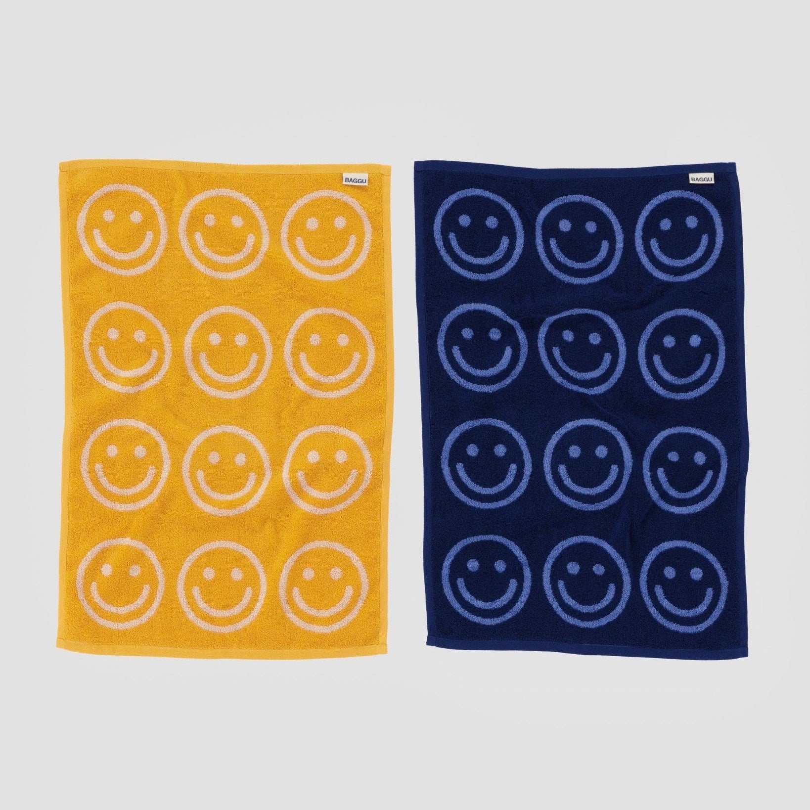 back of Reversible Hand Towel Set of 2 in Happy Blue Marigold with smiley face print