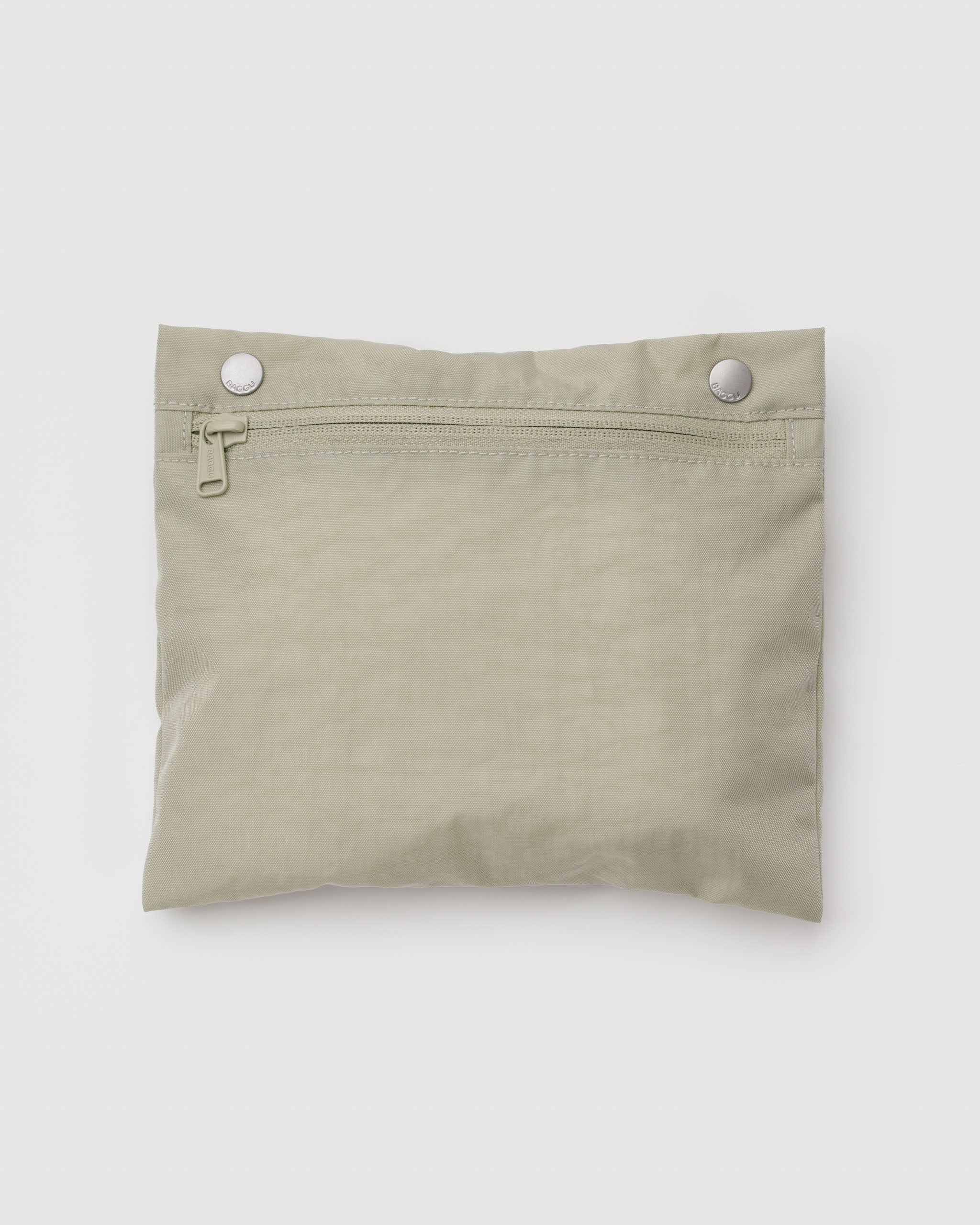 Light green removable interior snap pocket with zipper.