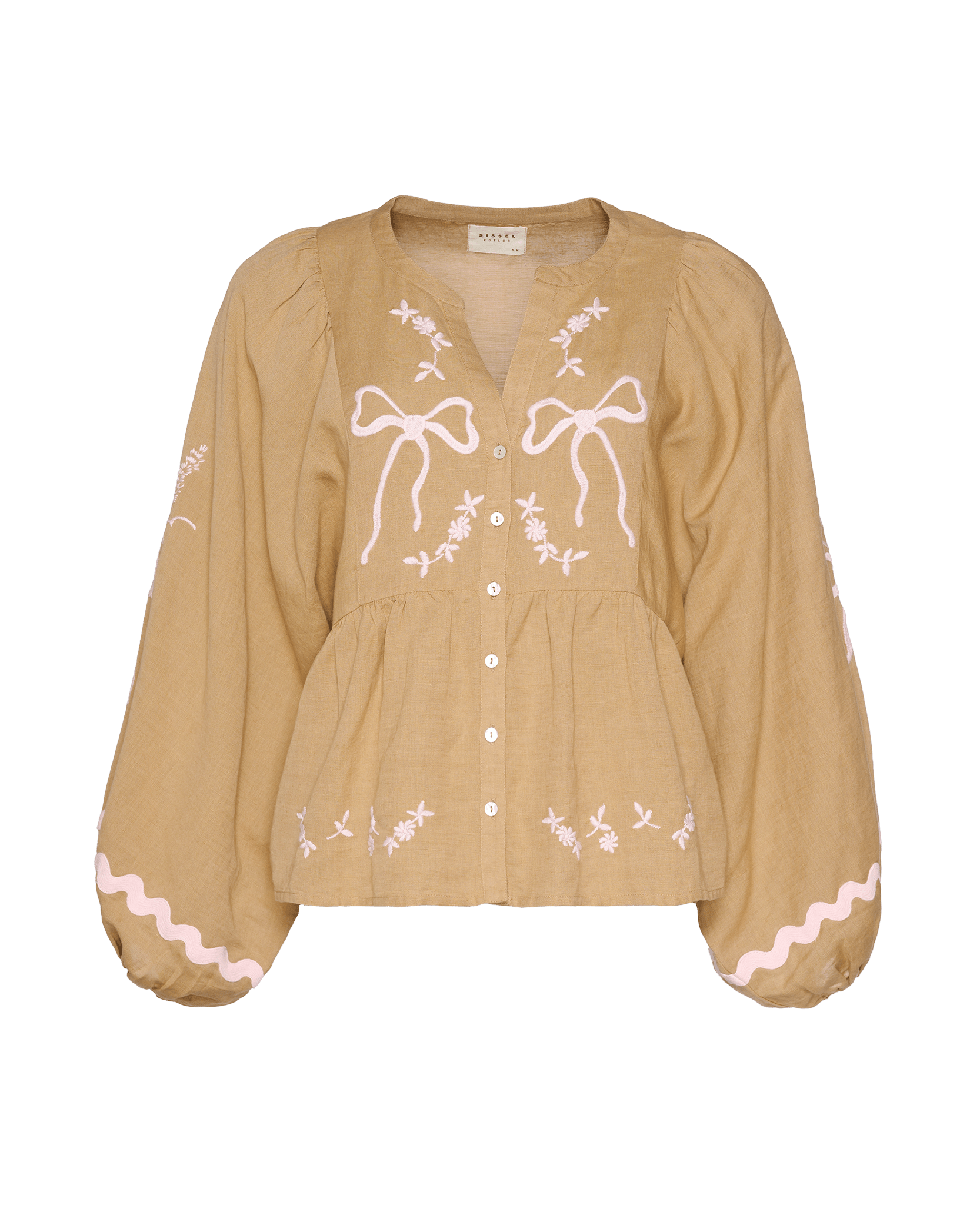 Front of a light brown long sleeve top with button front and pink embroidery.