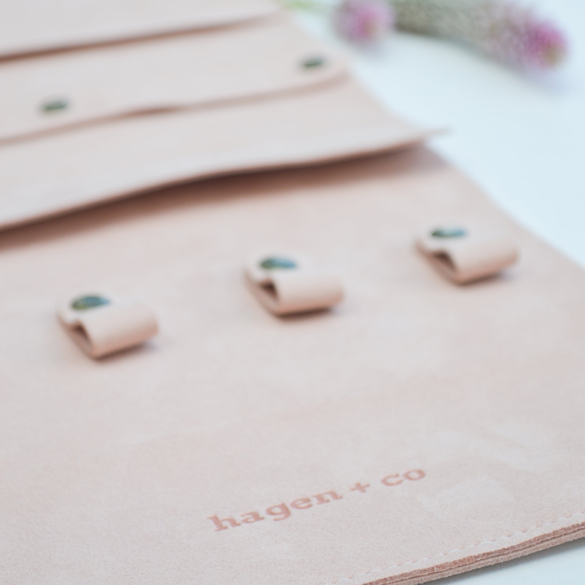 Inside storage clips and pouch of pink Jewellery Travel Wrap.