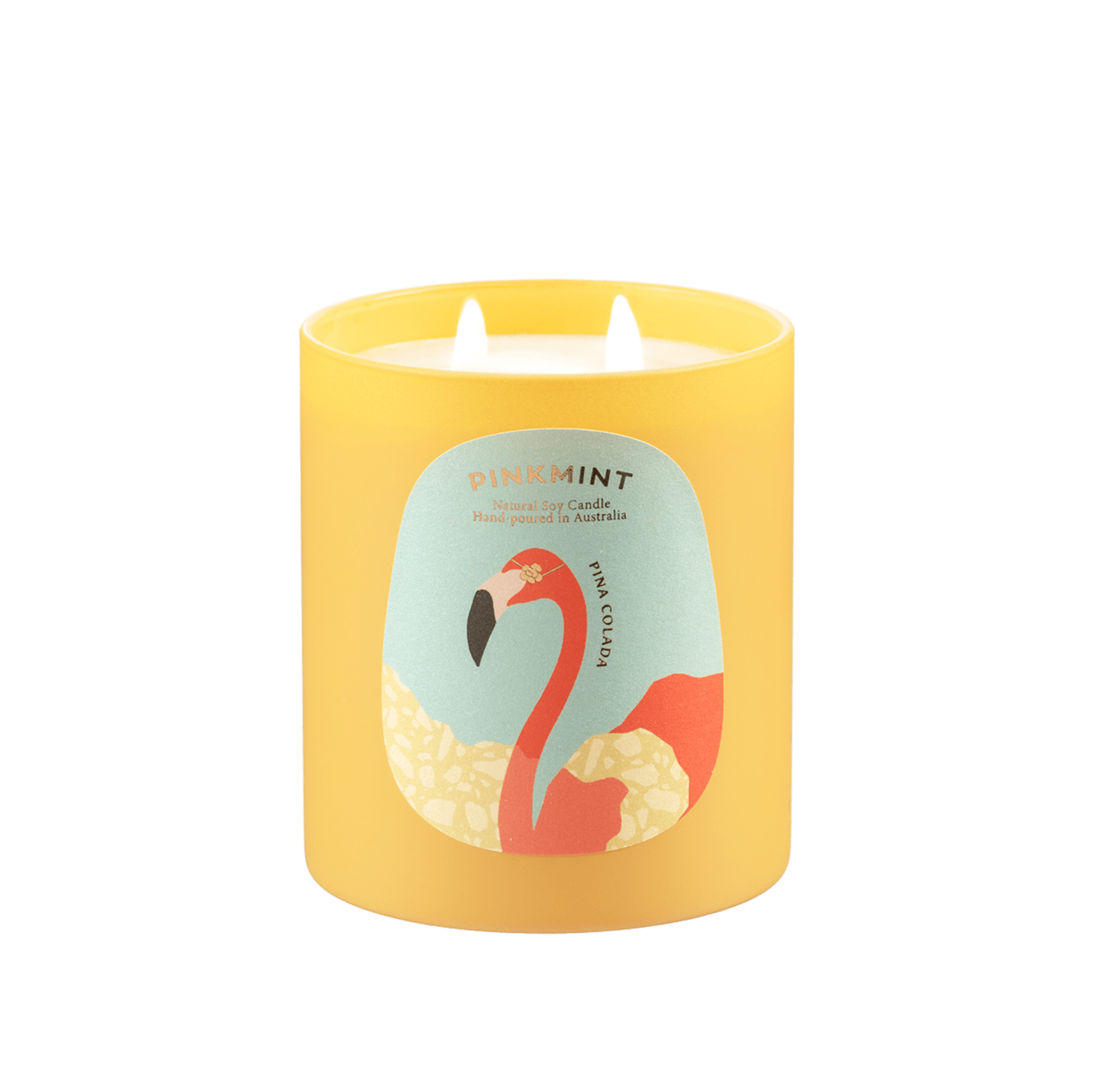 Yellow jar with double wick white candle inside and flamingo on label.