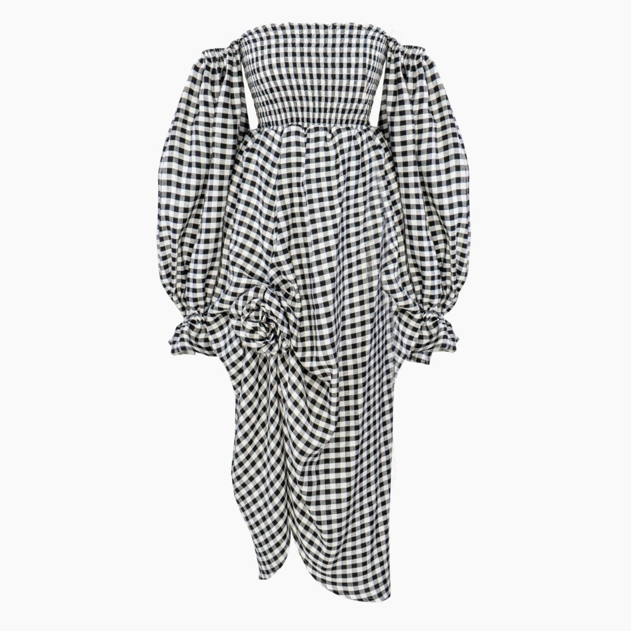 Women's Linen Dress with Rose Detail in Black and White gingham with long puff sleeves, front slit and smocking at bust.