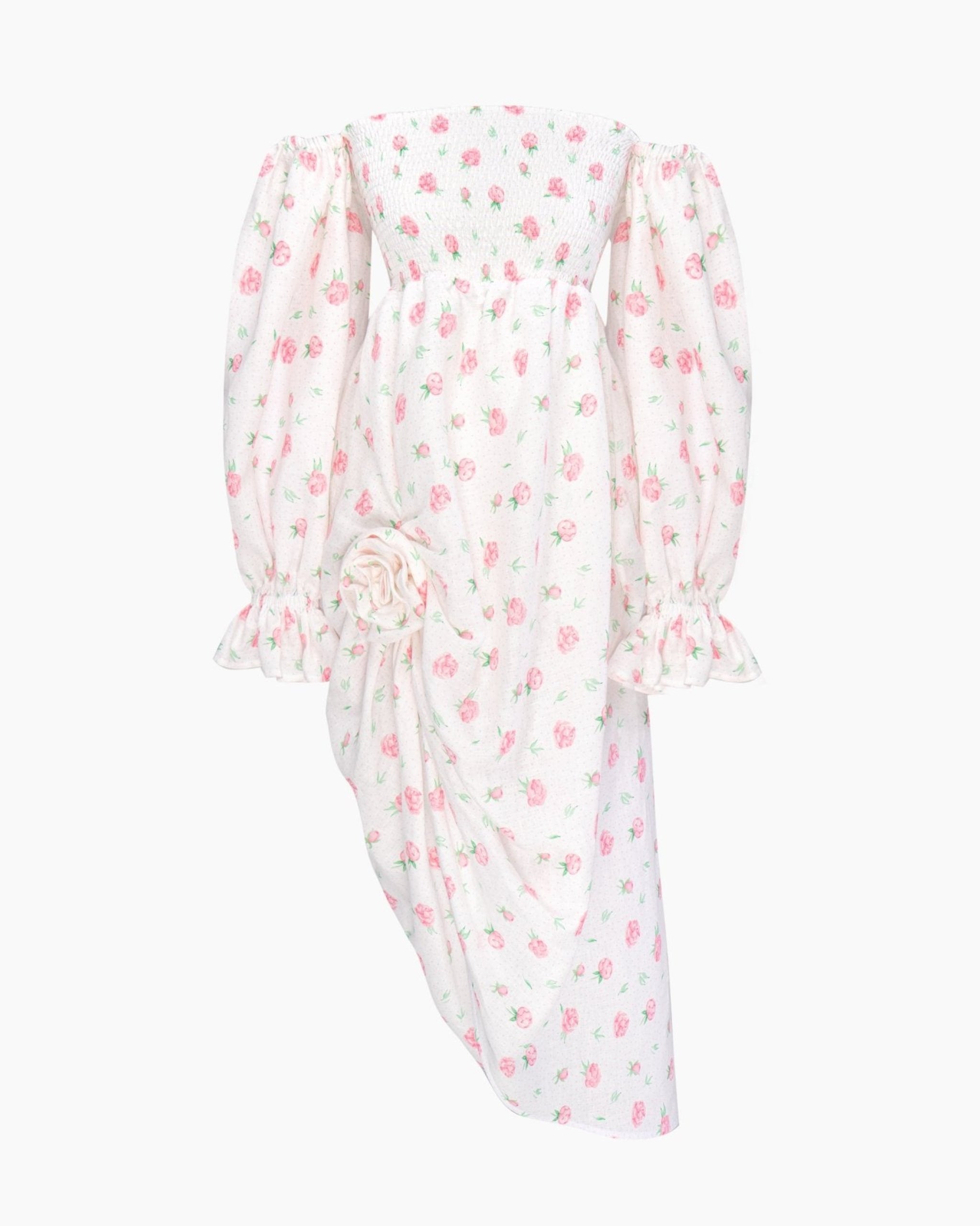 Women's white with rose print linen dress with handcrafted rosette at front slit, shirred bodice and long billowing sleeves.