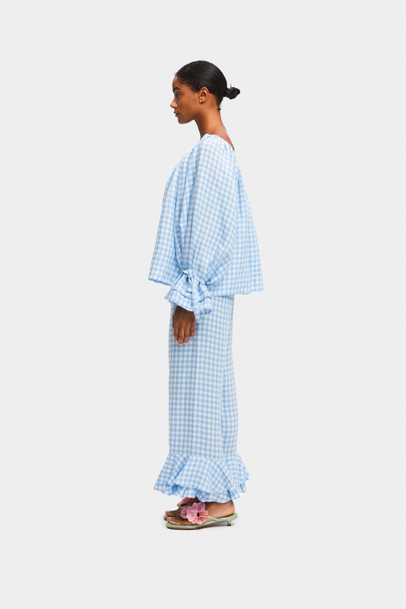 Side view of a woman wearing shirt and pants lounge set - ANNIE.G