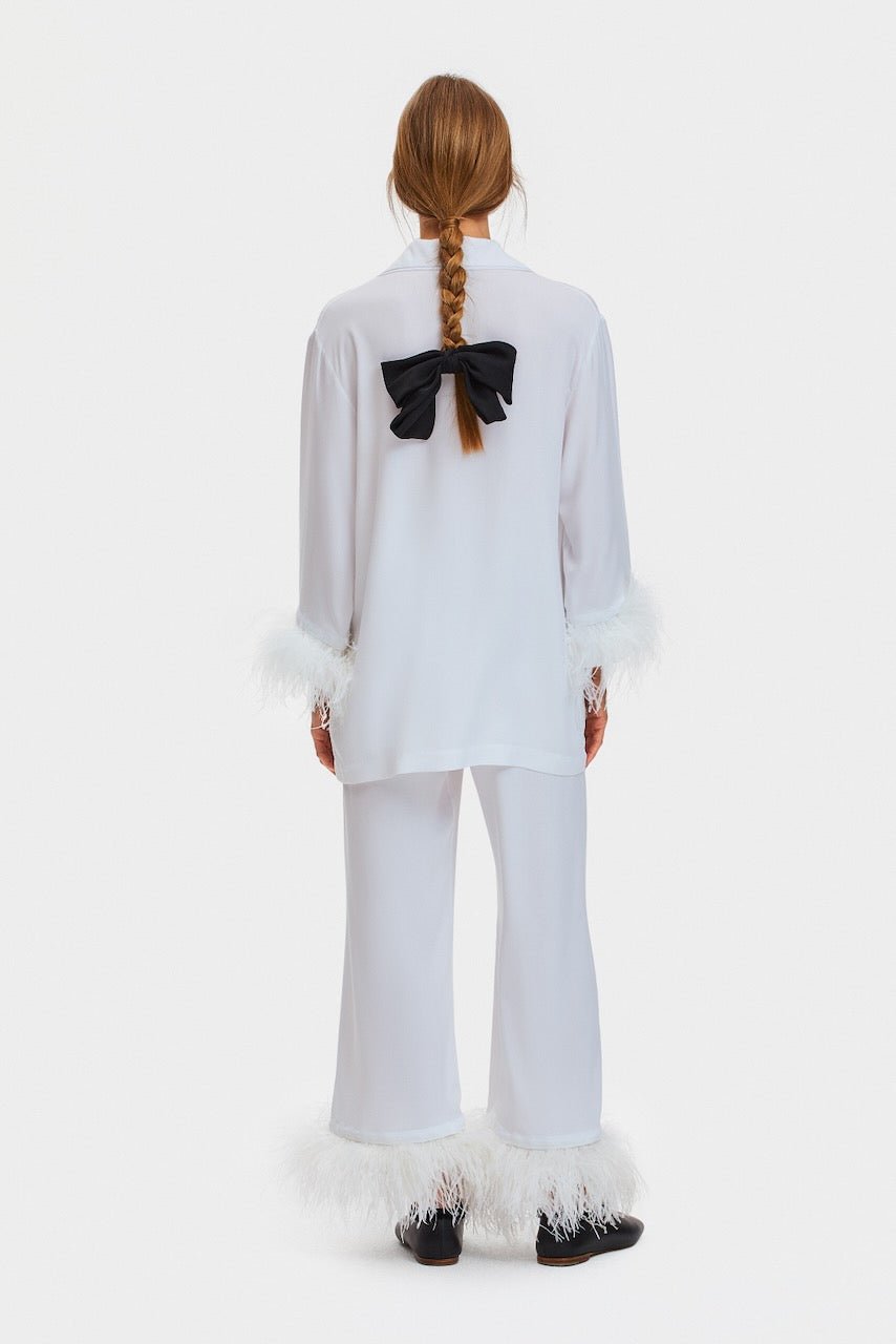 Back of woman wearing white Party Pyjamas Set with Double Feathers.