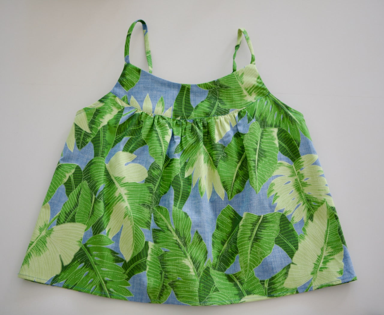 ANNIEG_ARIEL-CAMI-TOP-QLD-GREEN-LEAVES-FRONT