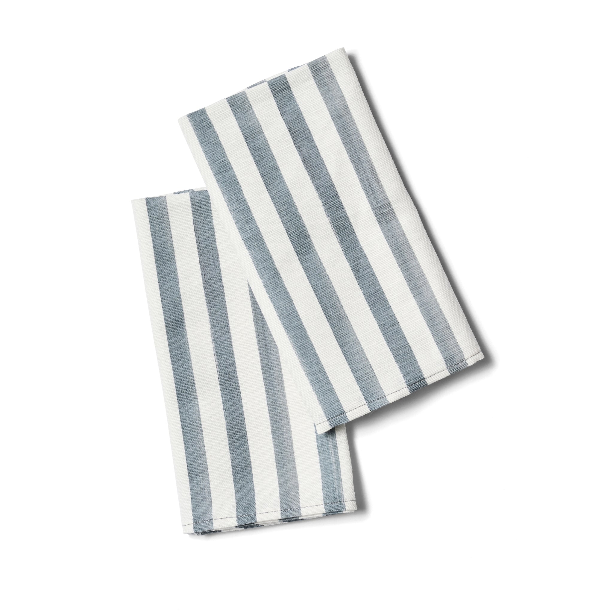 Two striped napkins with blue and white stripes folded.
