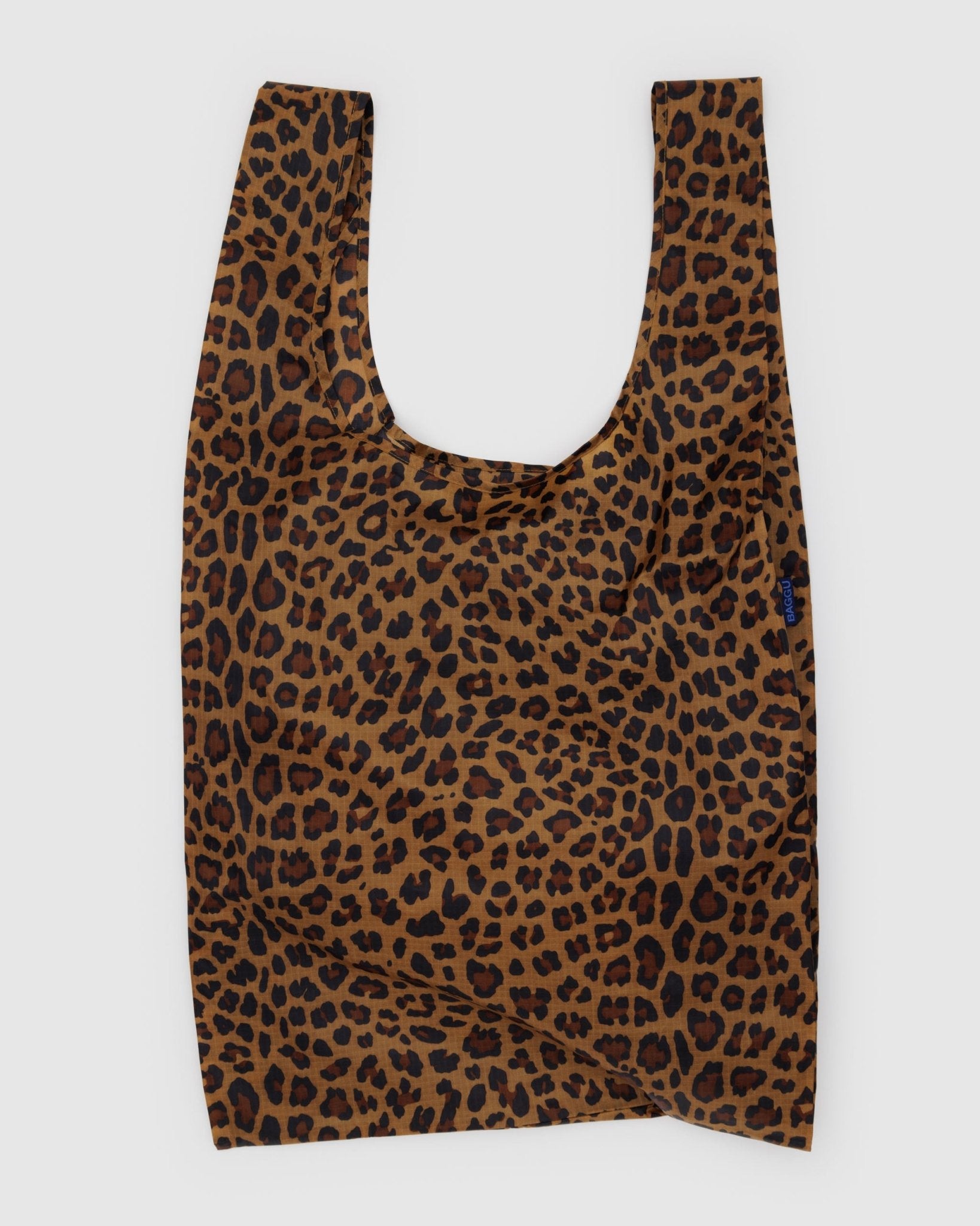 Leopard print on nylon reusable tote bag.