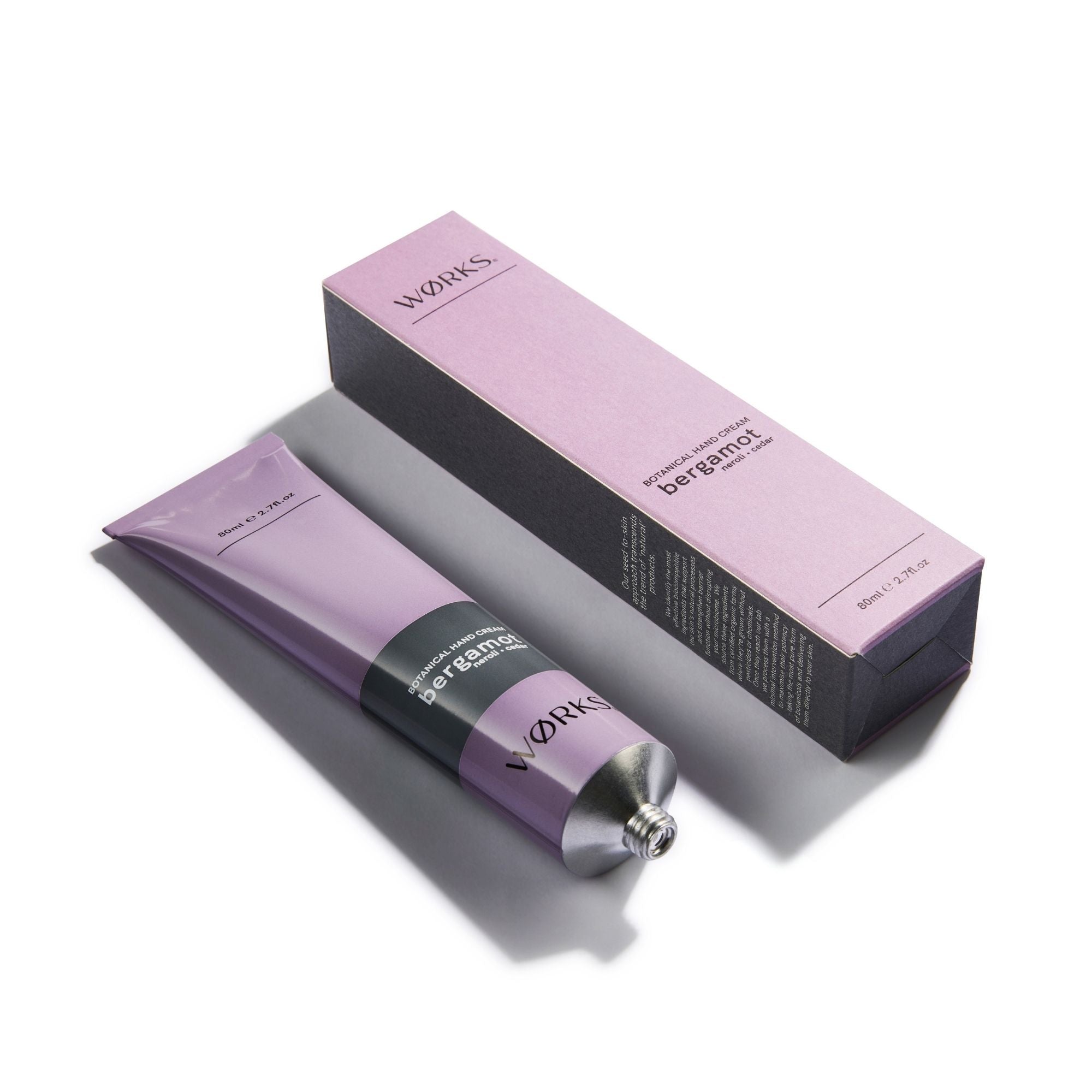 Purple aluminium tube and rectangular purple box packaging.