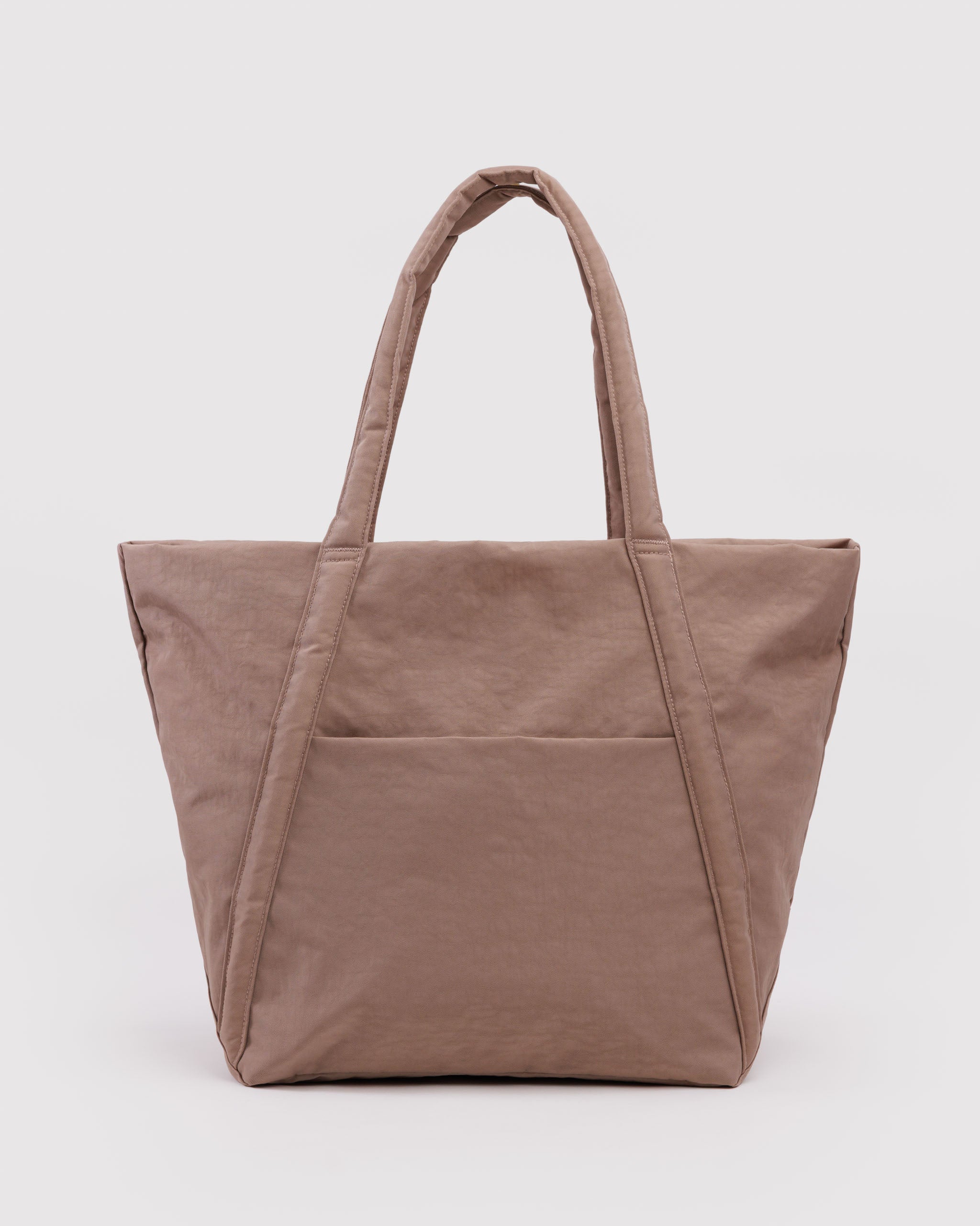 Brown tote bag with puffy handlesand front slip pocket.