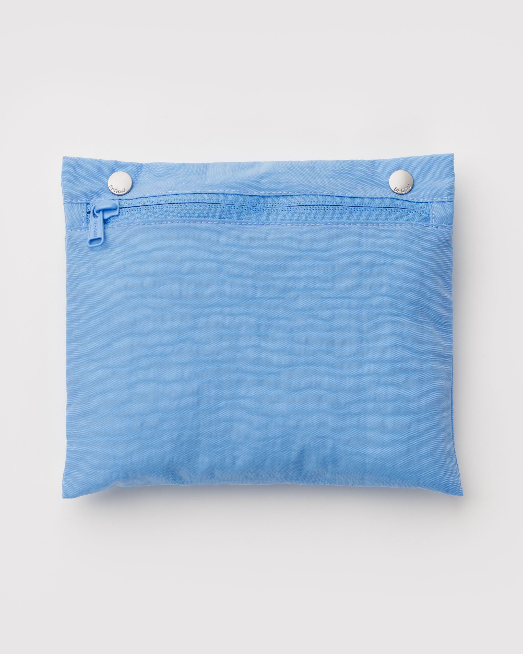 Blue pouch with a zipper and two metal clips.